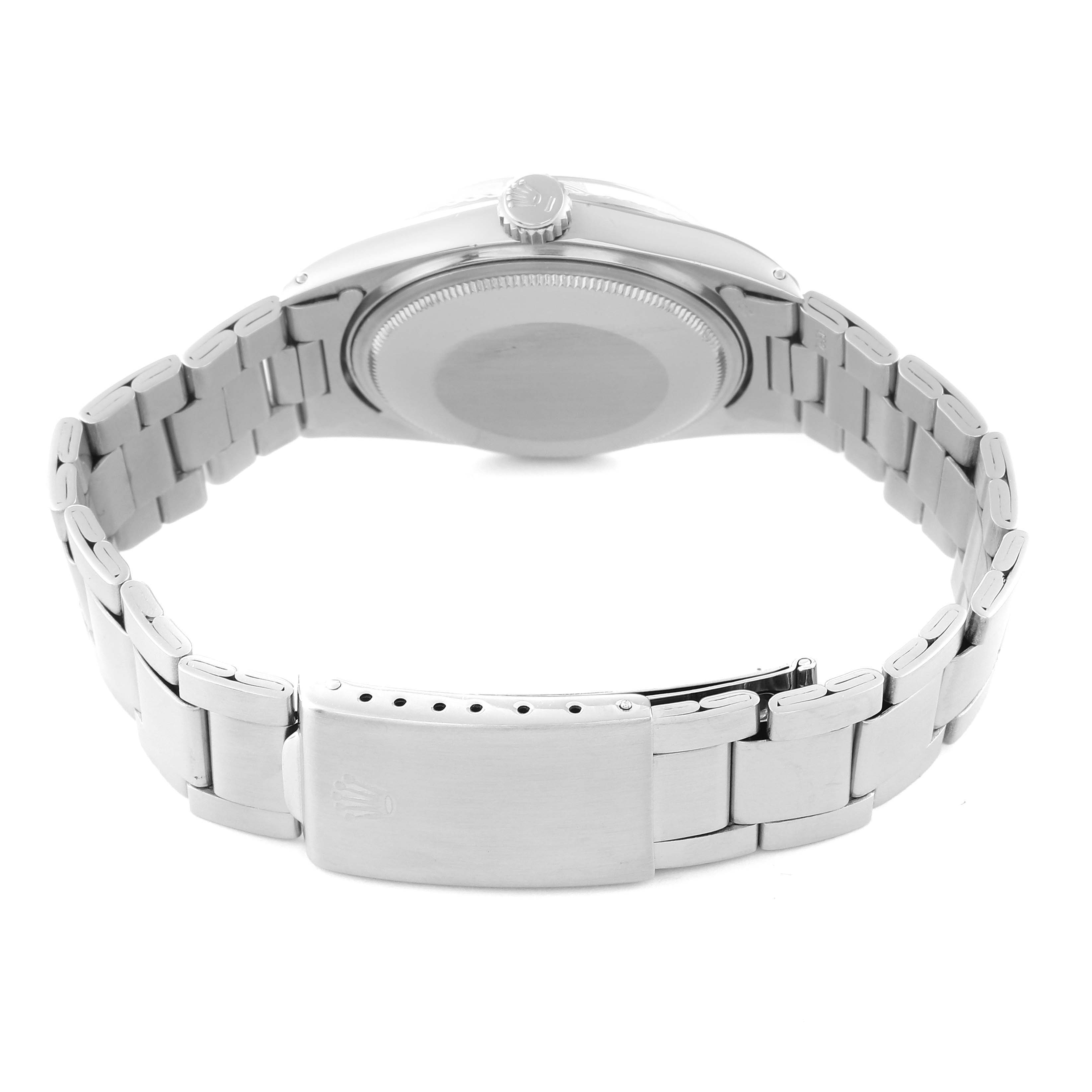 This image shows the back of the case and partially opened bracelet of a Rolex Vintage Collection 1603 Men's Stainless Steel Silver Dial 1603 Men's Stainless Steel Silver Dial watch.