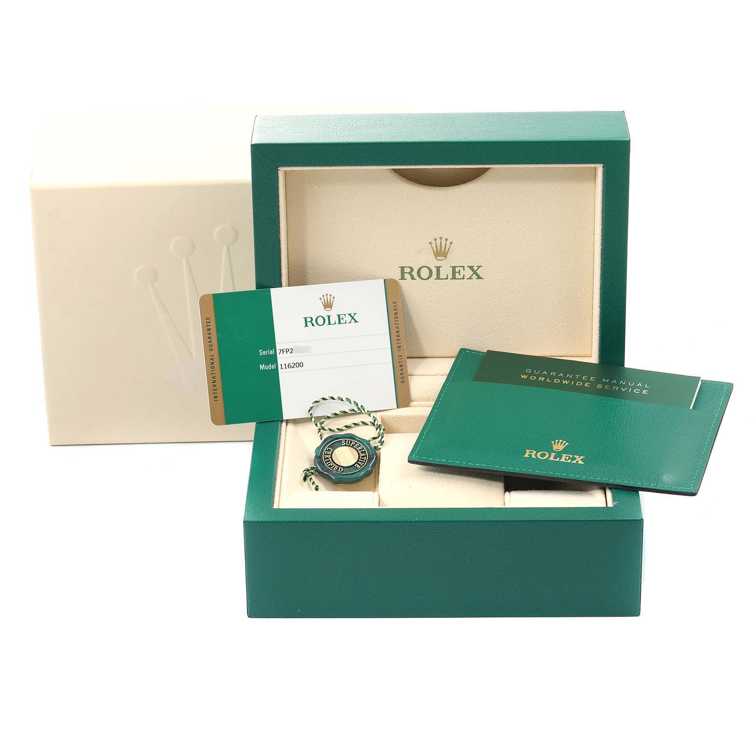 This is a Rolex Datejust 116200 Men's Stainless Steel Silver Dial 116200 Men's Stainless Steel Silver Dial packaging showing a green box, guarantee manual, warranty card, and hang tag from a front angle.
