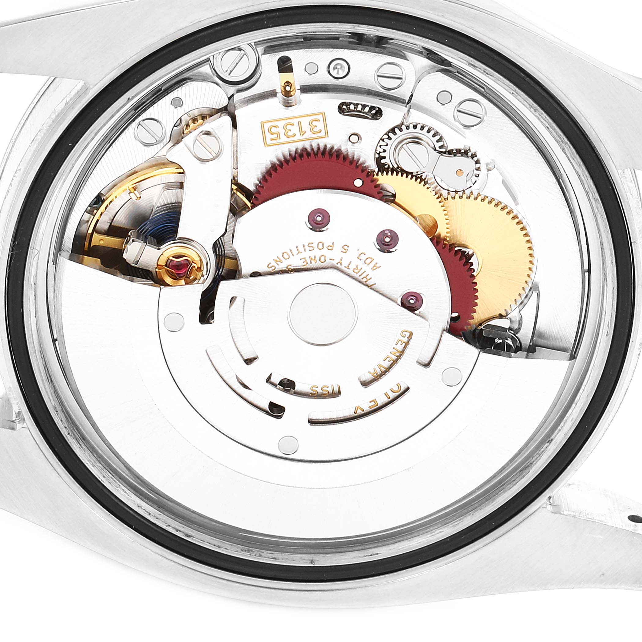 This image shows the internal mechanics and movement of a Rolex Datejust 116200 Men's Stainless Steel Silver Dial 116200 Men's Stainless Steel Silver Dial watch viewed from the back.