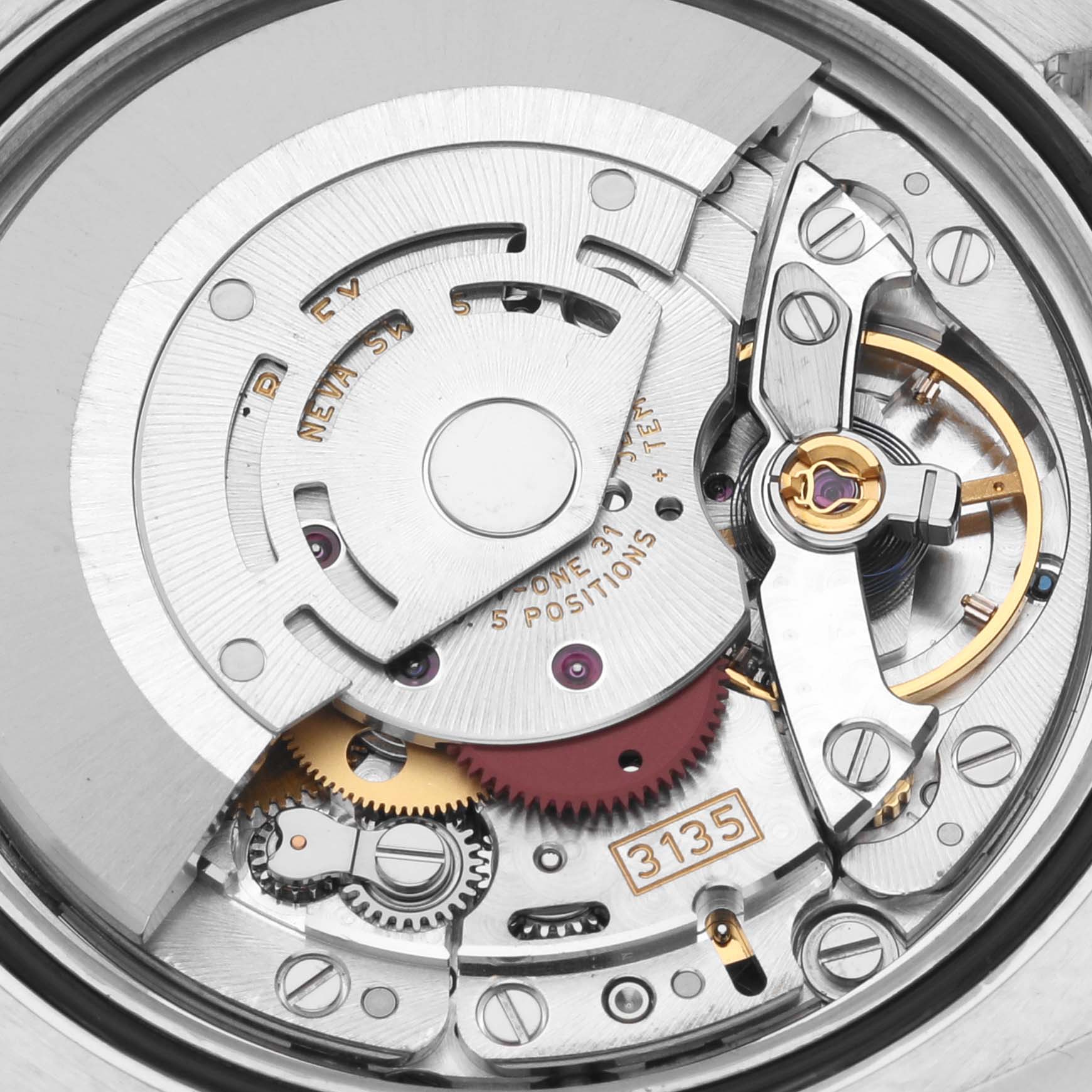 This image shows the internal watch mechanism, specifically the automatic movement, of a Rolex Datejust 116243 Men's Steel and Gold (two tone) Silver Dial 116243 Men's Steel and Gold (two tone) Silver Dial model.