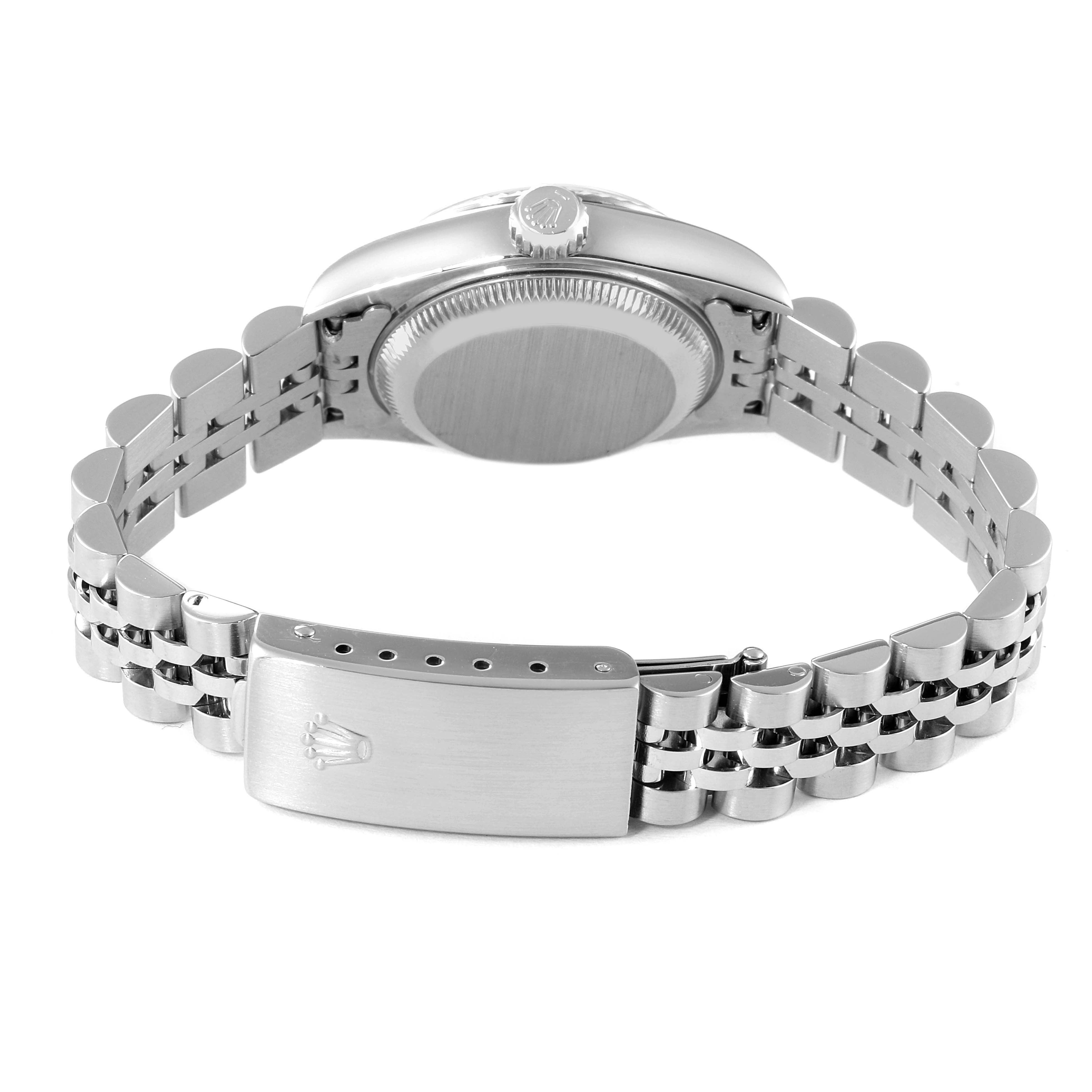 This image of the Rolex Datejust 79174 Women
s Stainless Steel Blue Dial 79174 Women
s Stainless Steel Blue Dial watch shows the case back, side profile, and bracelet clasp from a rear angle.