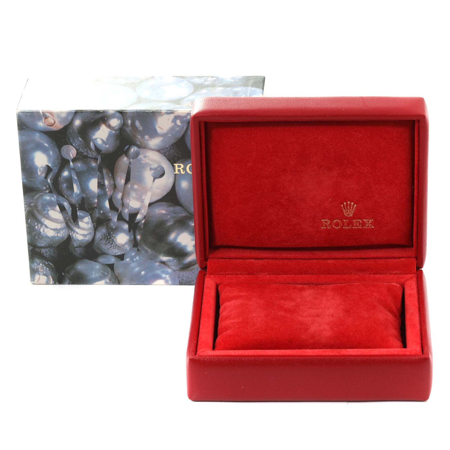 This image shows an empty Rolex Datejust 79174 Women's Stainless Steel White Dial 79174 Women's Stainless Steel White Dial watch box, with a red interior and a decorative exterior box.