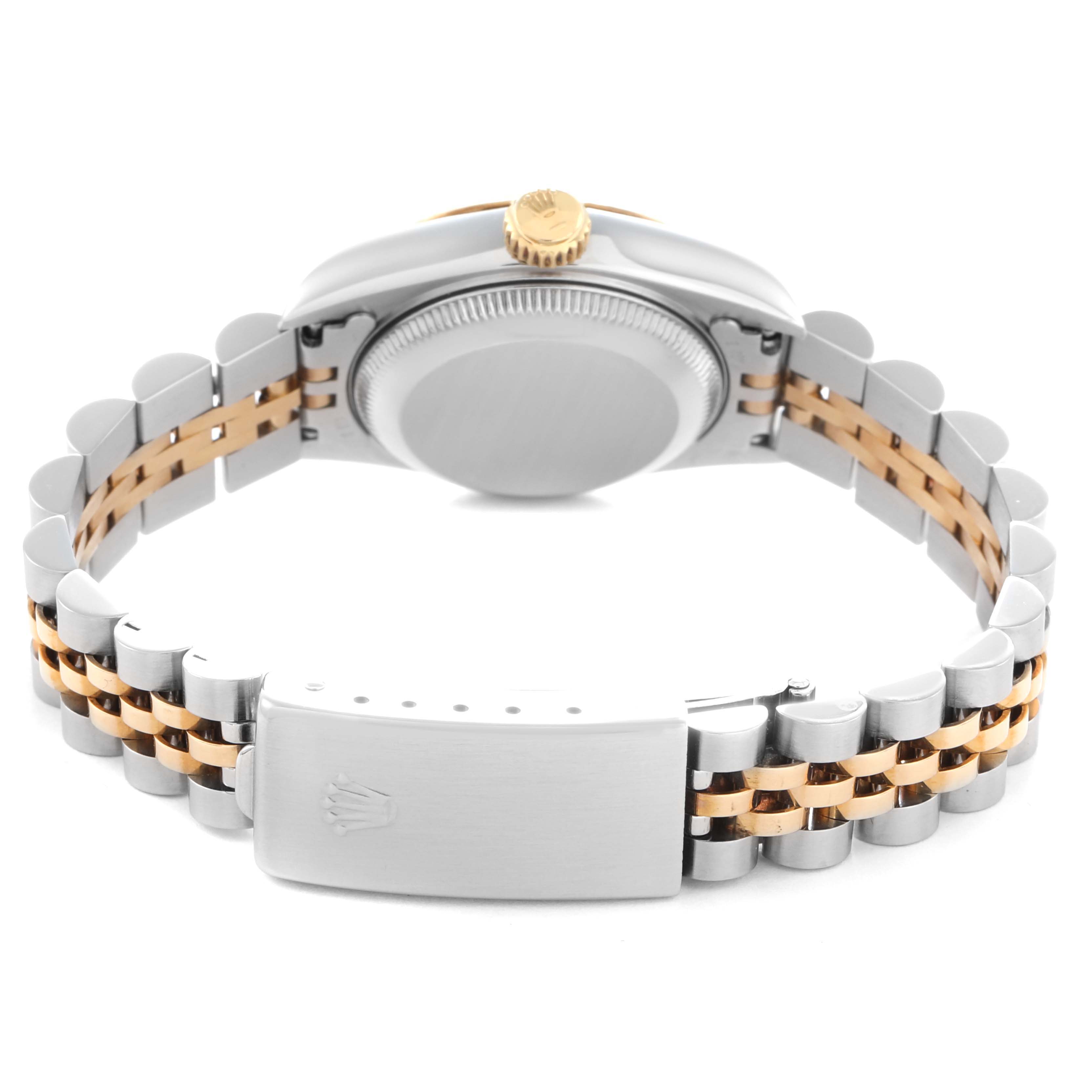 The image shows the back view of the Rolex Datejust 69173 Women
s Steel and Gold (two tone) Black Dial 69173 Women
s Steel and Gold (two tone) Black Dial, highlighting its case, jubilee bracelet, and the crown.