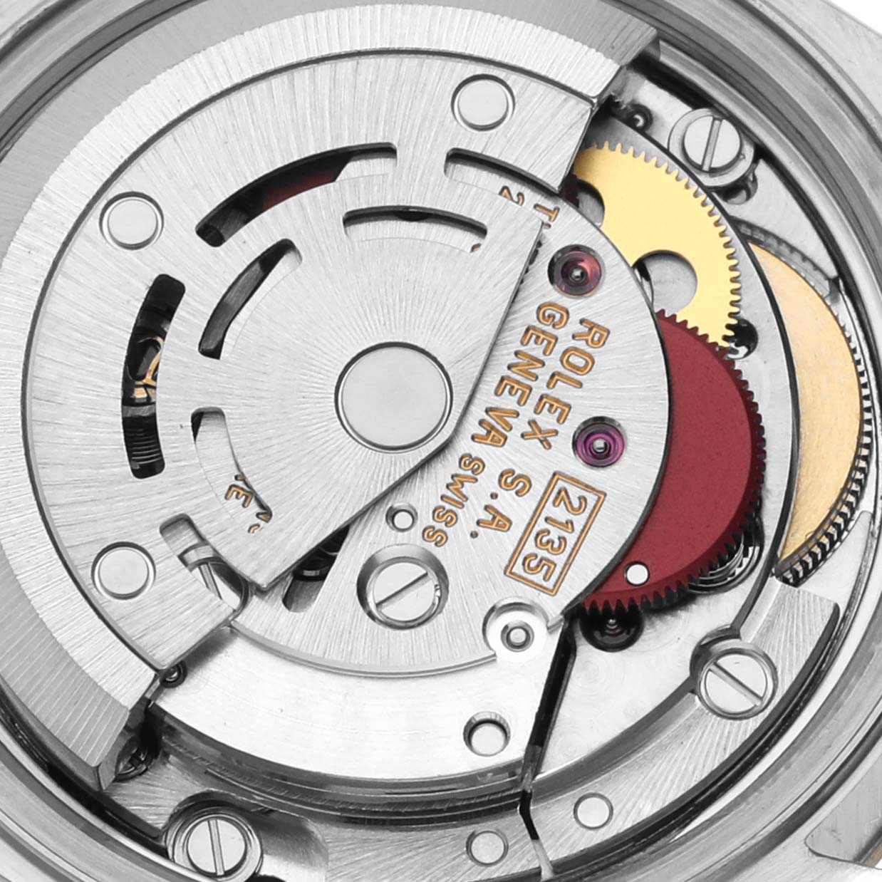This image shows a close-up of the movement of the Rolex Datejust 69173 Women's Steel and Gold (two tone) Champagne Dial 69173 Women's Steel and Gold (two tone) Champagne Dial model, featuring gears and the rotor.