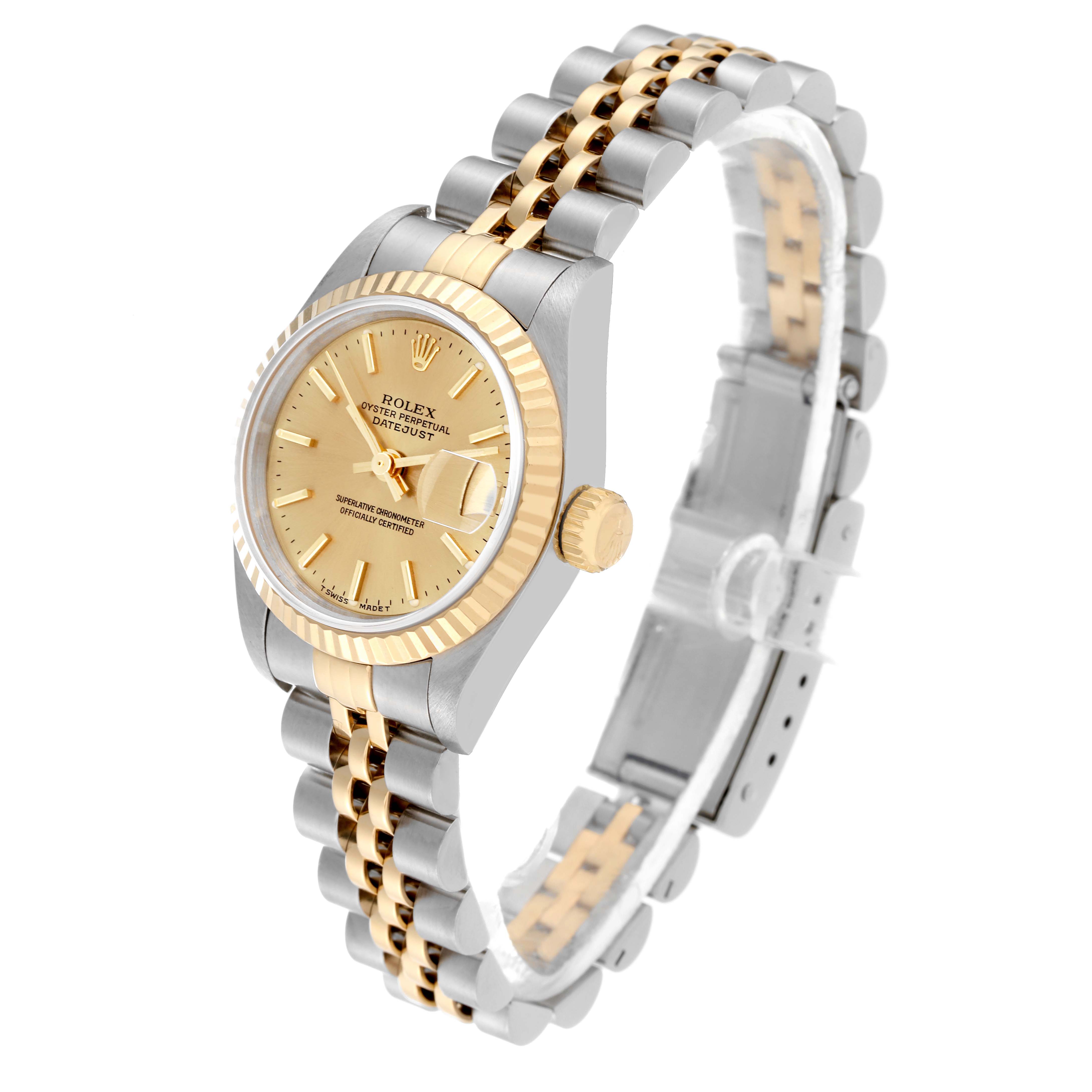 The Rolex Datejust 69173 Women's Steel and Gold (two tone) Champagne Dial 69173 Women's Steel and Gold (two tone) Champagne Dial watch is shown at a three-quarter angle, highlighting its gold dial, two-tone bracelet, and fluted bezel.