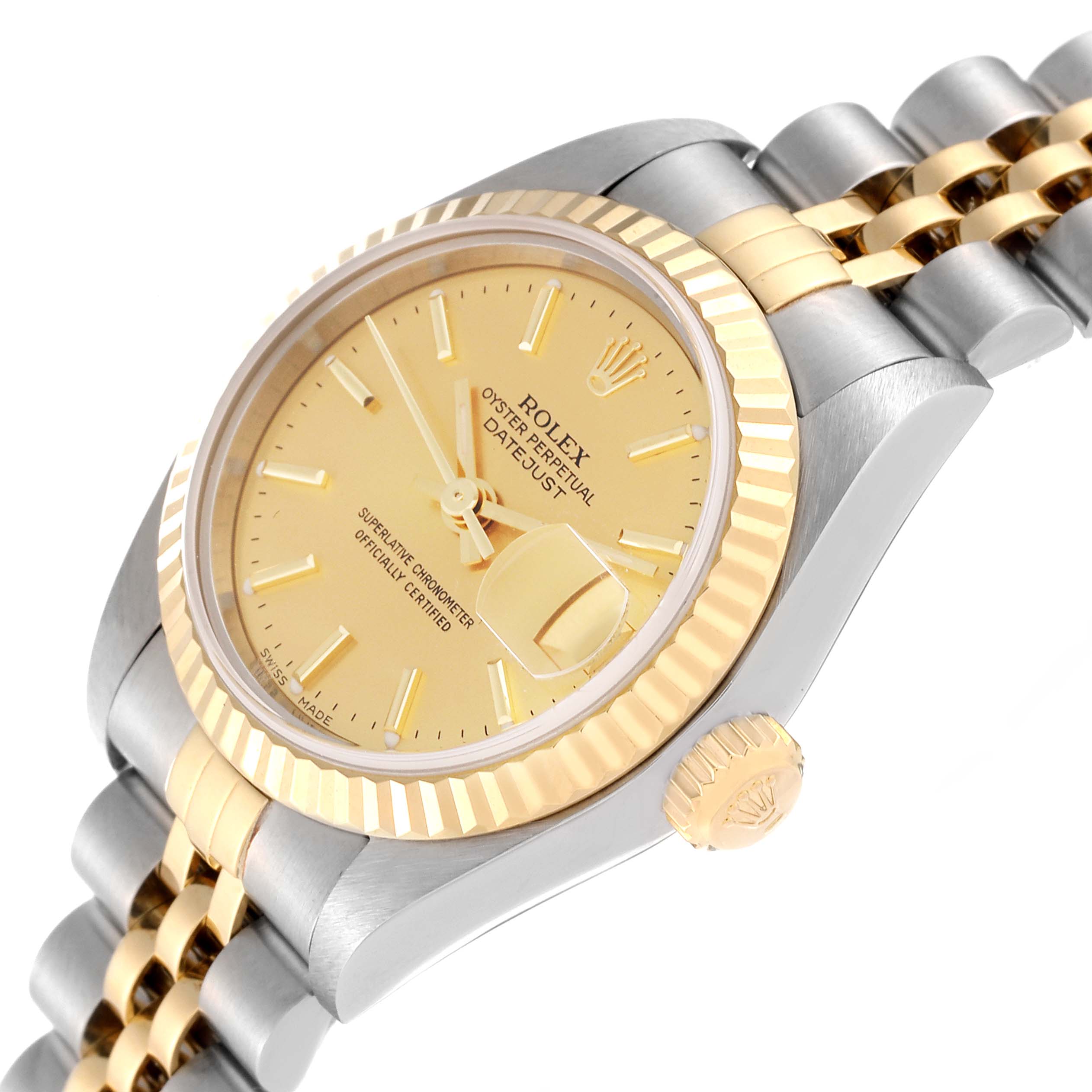 This image of the Rolex Datejust 79173 Women's Steel and Gold (two tone) Champagne Dial 79173 Women's Steel and Gold (two tone) Champagne Dial watch shows a side angle highlighting the gold bezel, crown, and two-tone bracelet.