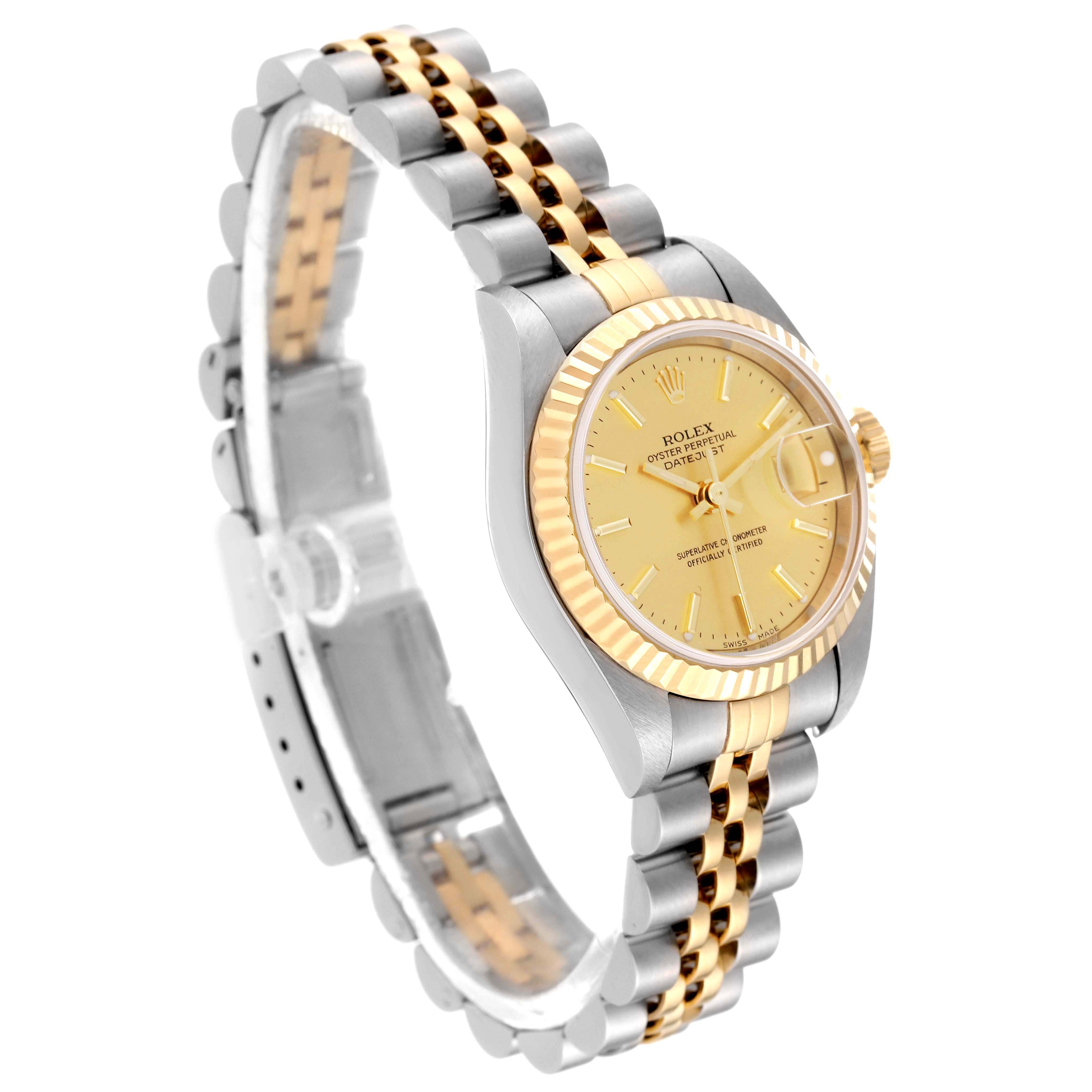The Rolex Datejust 79173 Women's Steel and Gold (two tone) Champagne Dial 79173 Women's Steel and Gold (two tone) Champagne Dial watch is shown from an angled front view, displaying its gold dial, fluted bezel, and two-tone Jubilee bracelet.
