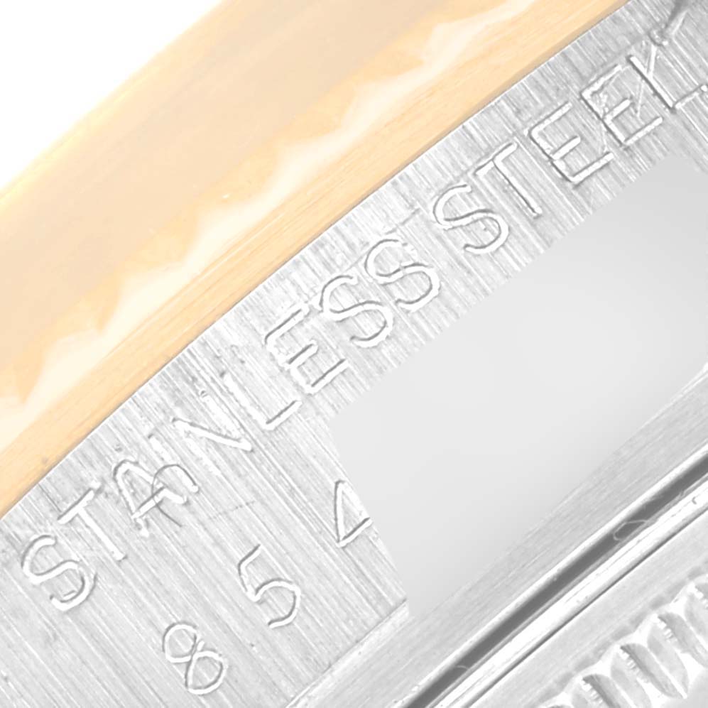 The image shows a close-up of the case edge of a Rolex Vintage Collection 16013 Men's Steel and Gold (two tone) Silver Dial 16013 Men's Steel and Gold (two tone) Silver Dial model, highlighting the "STAINLESS STEEL" engraving.