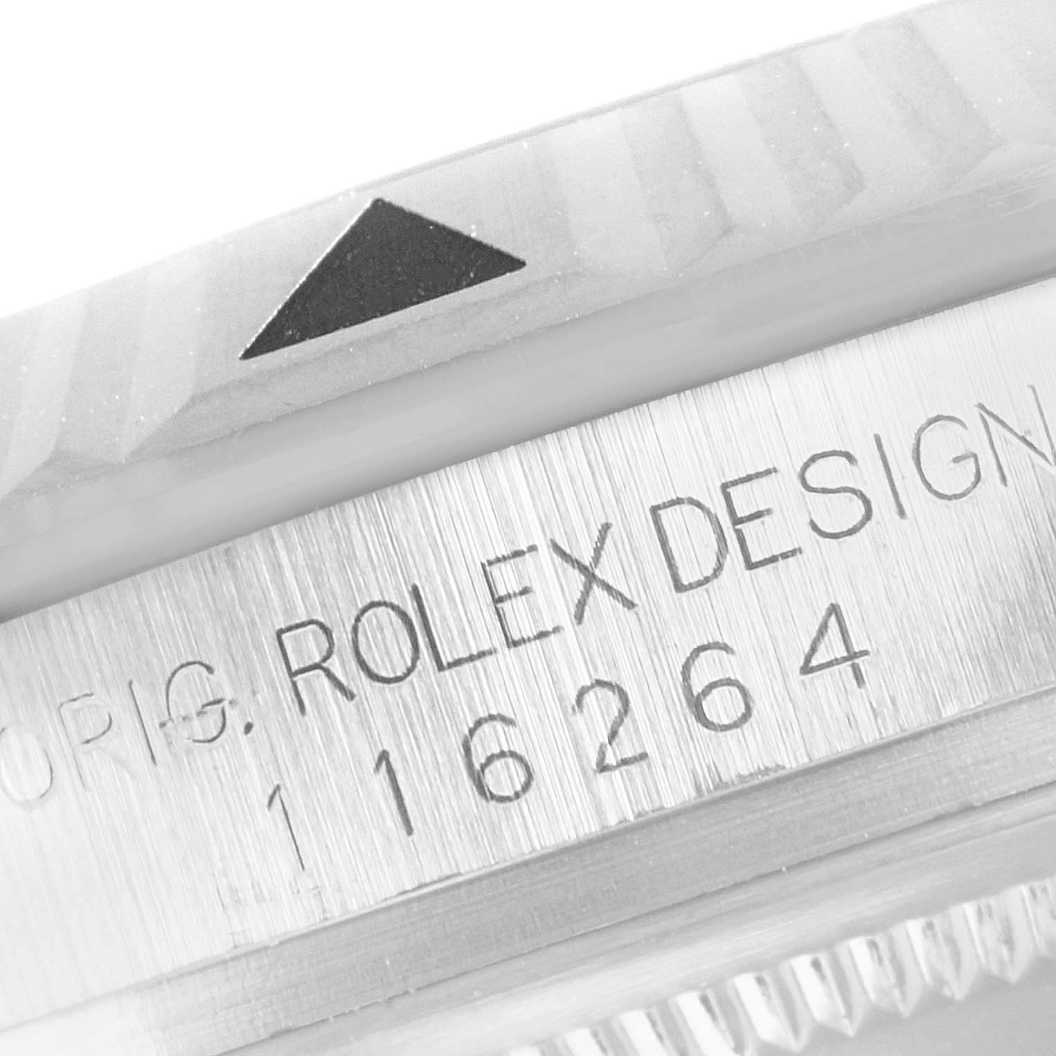 The image shows a close-up angle of the Rolex Turn-o-Graph 116264 Men
s Stainless Steel Blue Dial 116264 Men
s Stainless Steel Blue Dial model
s case, highlighting the serial number and part of the bezel.