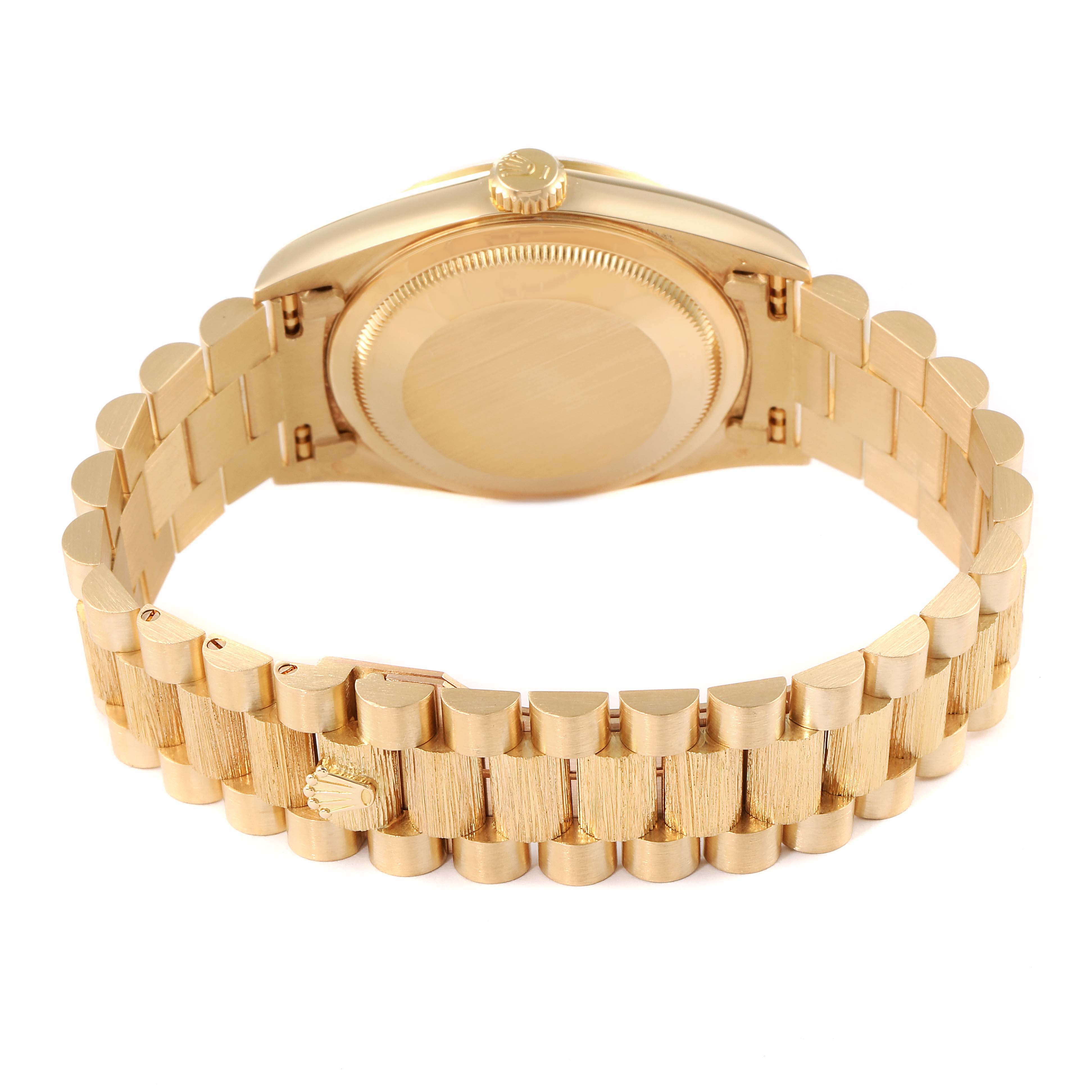 The image shows the back view of a Rolex President 18248 Men
s Yellow Gold Champagne Dial 18248 Men
s Yellow Gold Champagne Dial model watch, displaying the case back and bracelet.