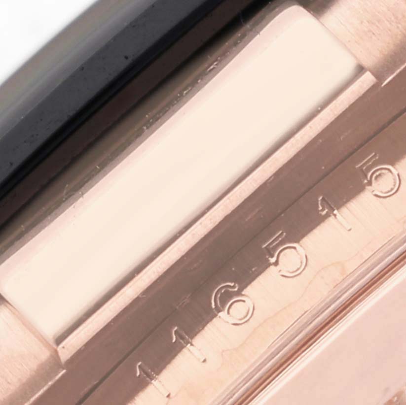 The image shows a close-up of the serial number engraving on the side of a Rolex Daytona 116515 Men
s Rose Gold Brown Dial 116515 Men
s Rose Gold Brown Dial watch.