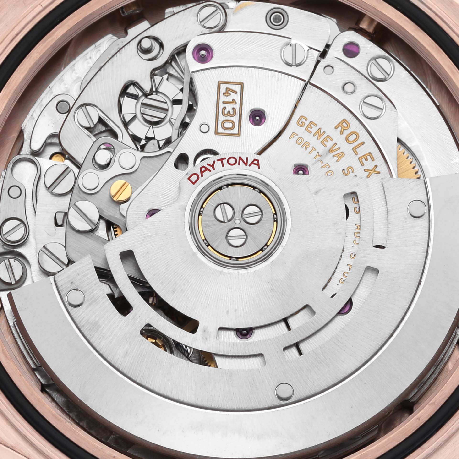 The image shows a detailed close-up of the Rolex Daytona 116515 Men
s Rose Gold Brown Dial 116515 Men
s Rose Gold Brown Dial watch movement, focusing on the rotor and gears.