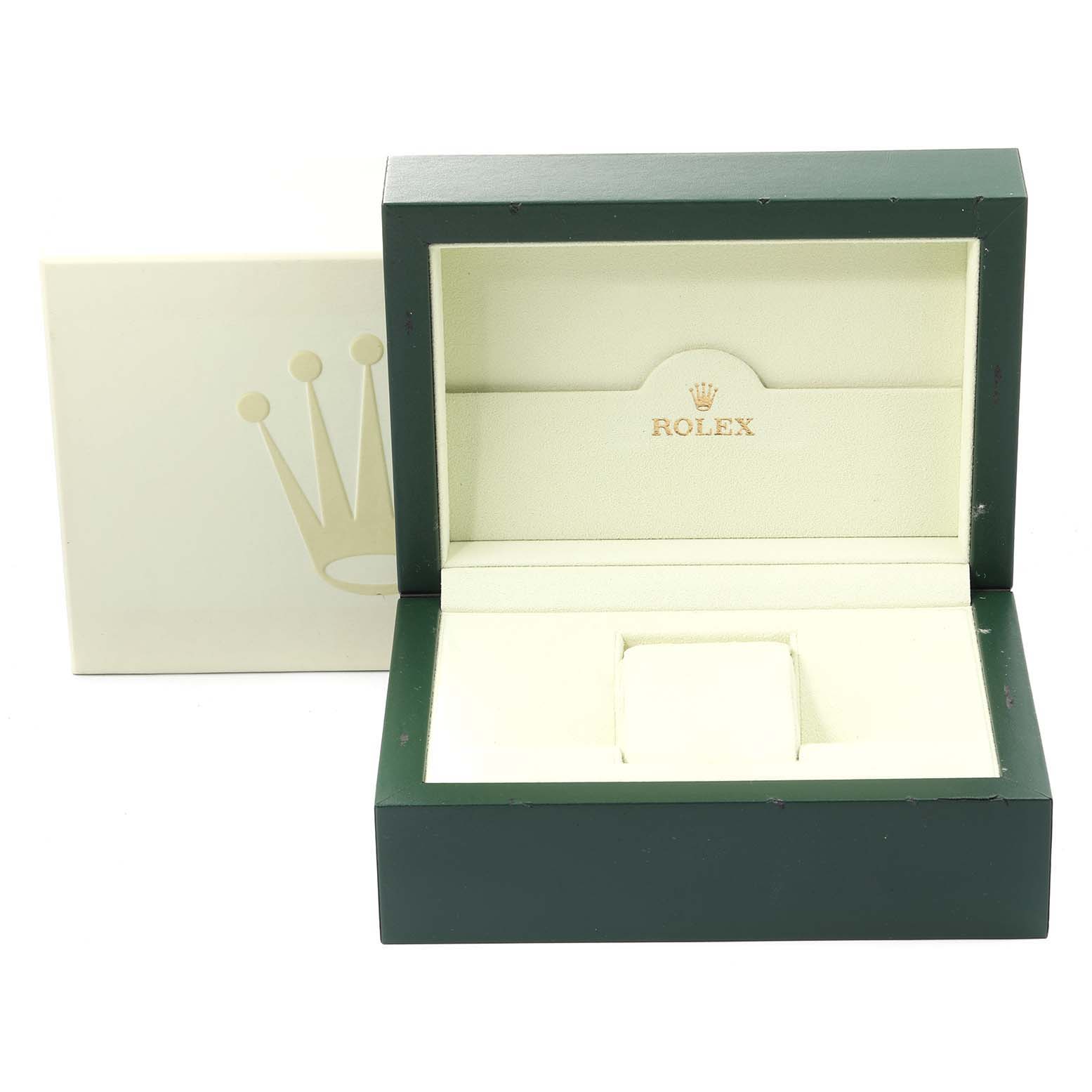 This image shows an open Rolex Explorer 16570 Men's Stainless Steel White Dial 16570 Men's Stainless Steel White Dial model watch box and its outer packaging at a front angle.