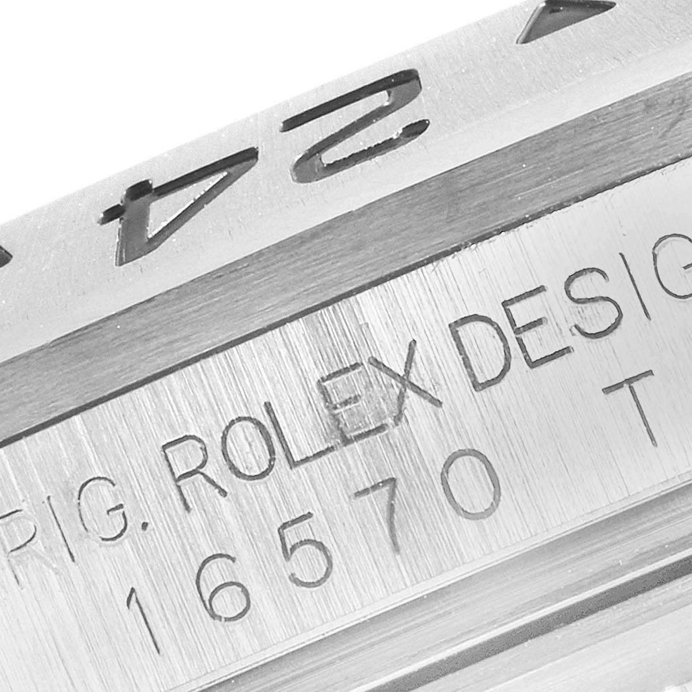 This image shows a close-up of the bezel and case side engraving of the Rolex Explorer 16570 Men
s Stainless Steel White Dial 16570 Men
s Stainless Steel White Dial watch model 16570.