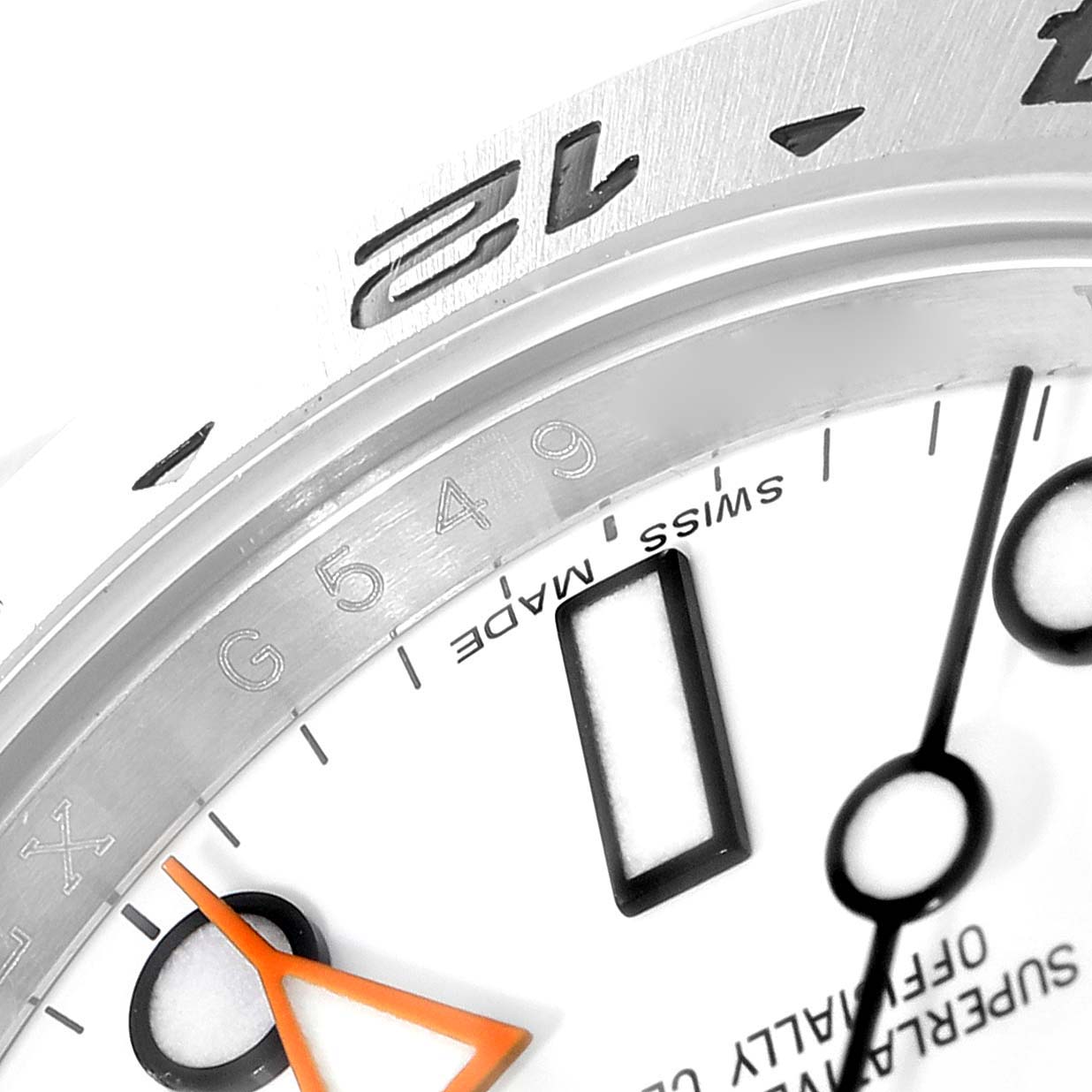 The image shows a close-up of the dial, hands, and part of the bezel of the Rolex Explorer 216570 Men's Stainless Steel White Dial 216570 Men's Stainless Steel White Dial watch model.