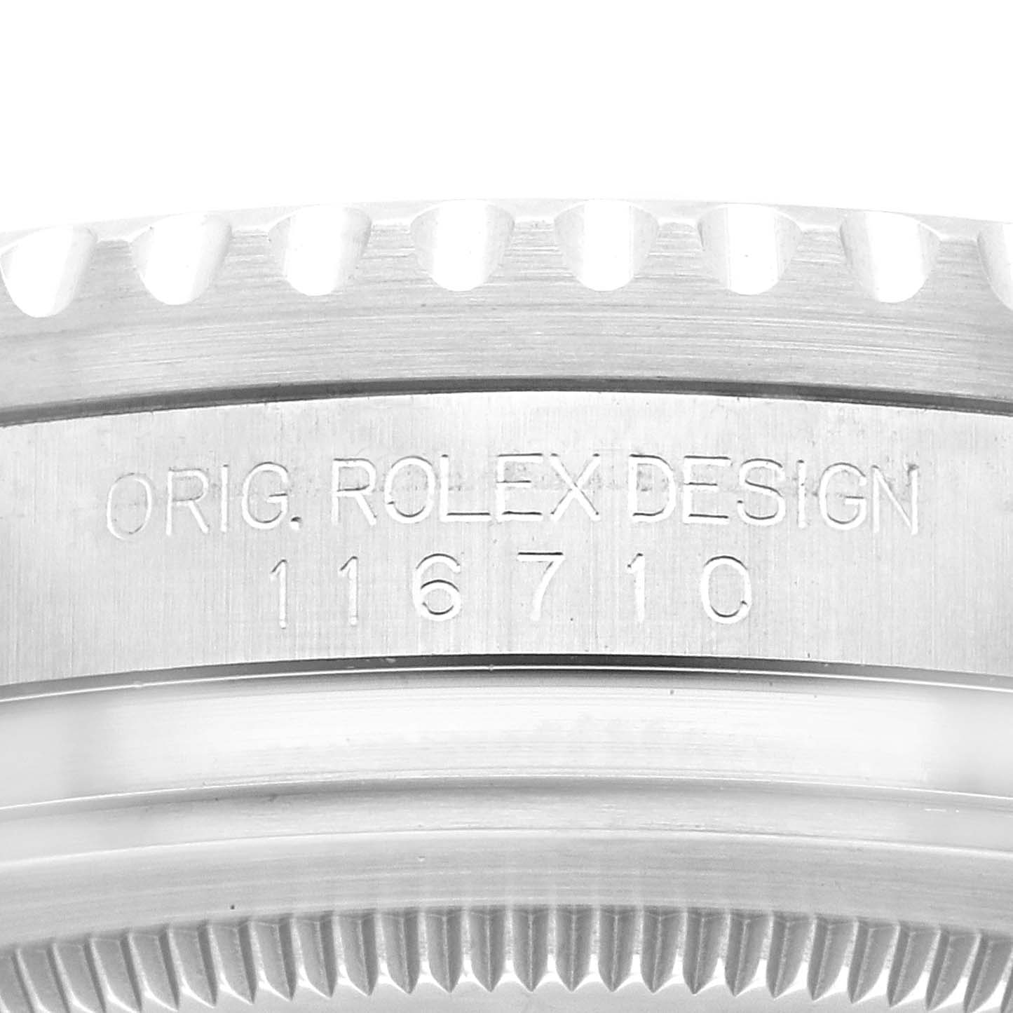 This image shows the engraved watch case of a Rolex GMT-Master 116710BLNR Men
s Stainless Steel Black Dial 116710BLNR Men
s Stainless Steel Black Dial viewed from the side, displaying the model number "116710."