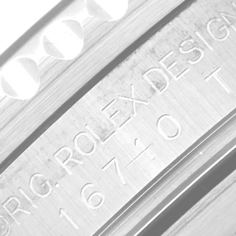 This close-up image shows the engraving on the side of the case of a Rolex GMT-Master 16710 Men
s Stainless Steel Black Dial 16710 Men
s Stainless Steel Black Dial watch.