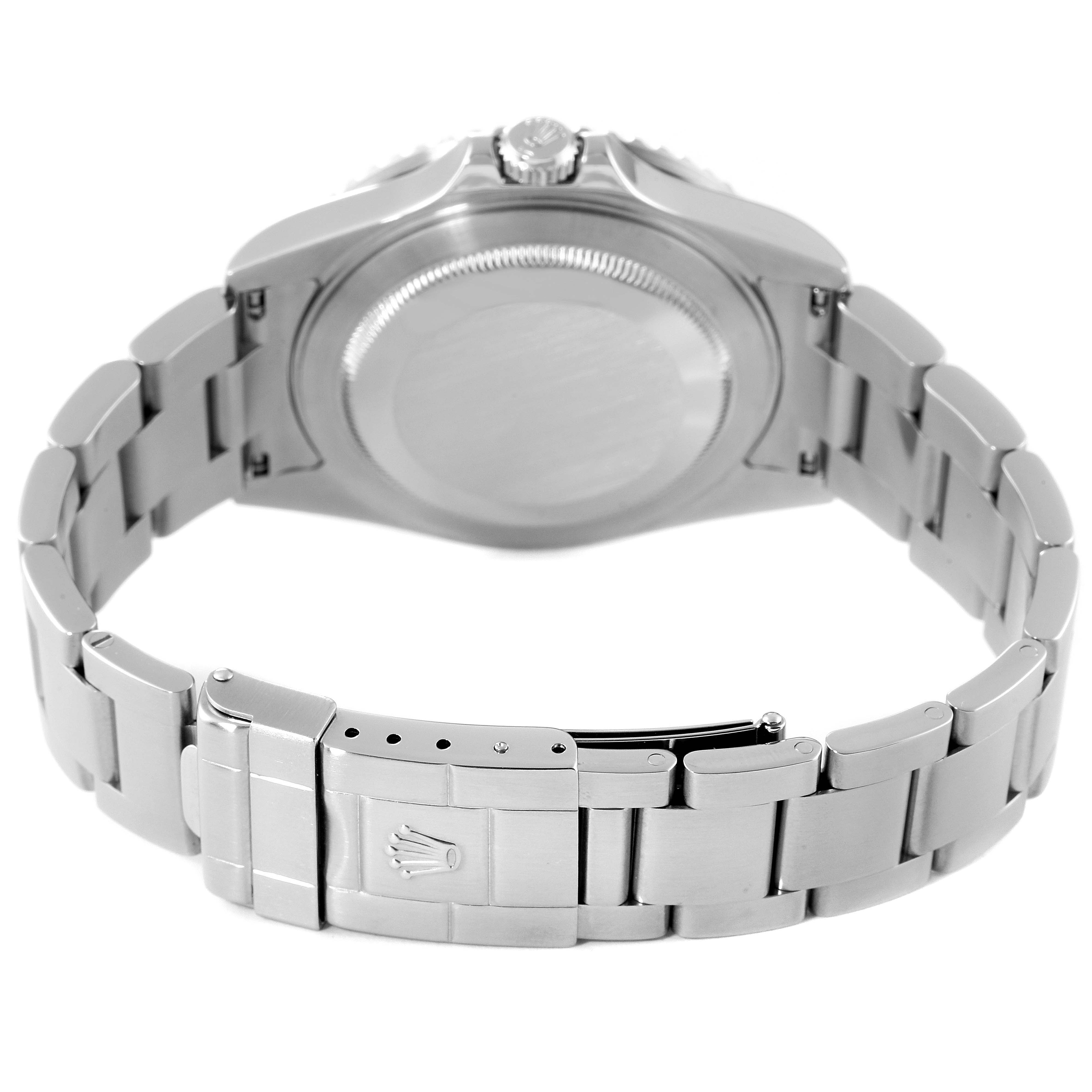 This image shows the backside of a Rolex GMT-Master 16710 Men's Stainless Steel Black Dial 16710 Men's Stainless Steel Black Dial, highlighting the case back and metal bracelet with the clasp.