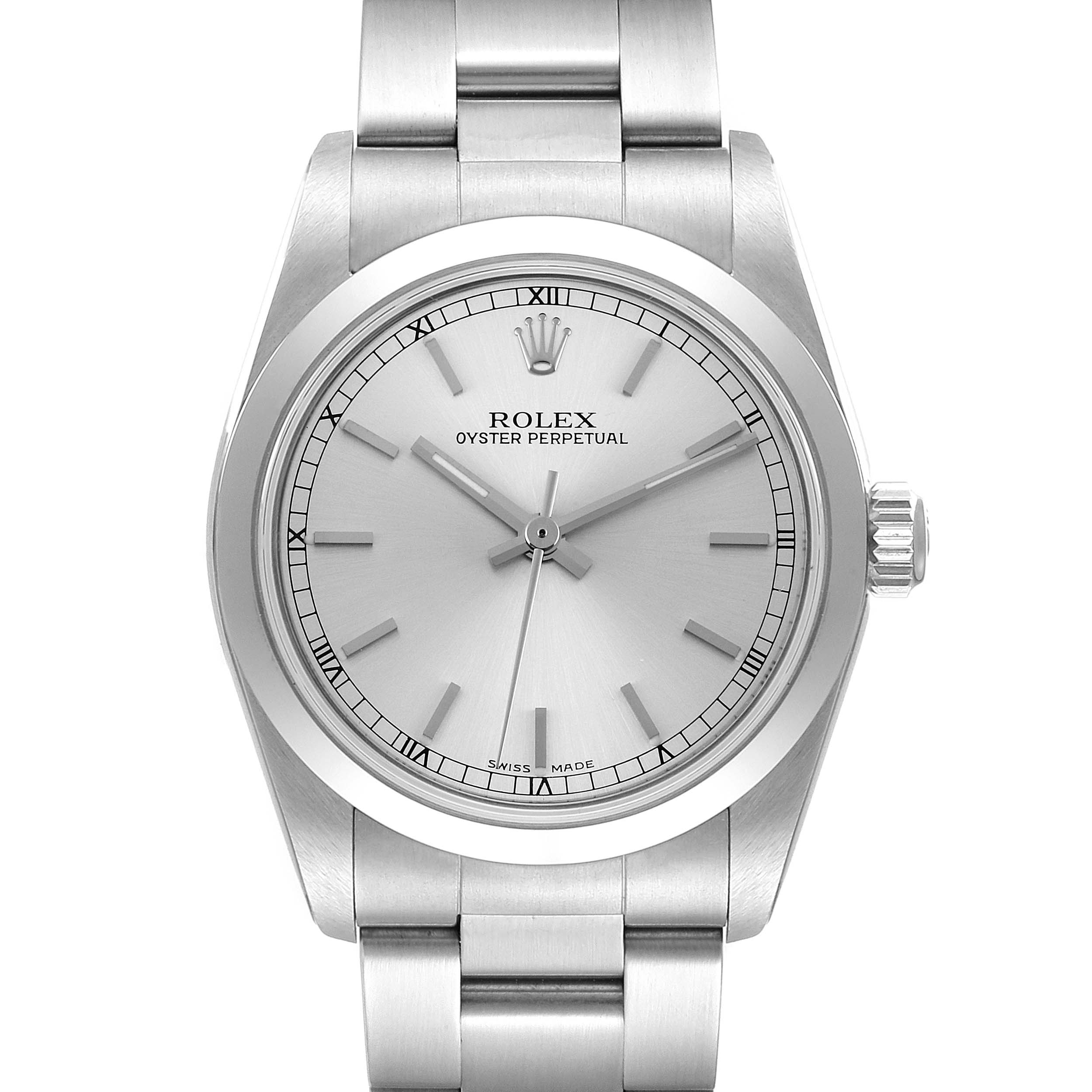 The image shows a Rolex Mid-Size 77080 Women
s Stainless Steel Silver Dial 77080 Women
s Stainless Steel Silver Dial Oyster Perpetual watch, highlighting its silver dial, bezel, and bracelet from a front-facing angle.