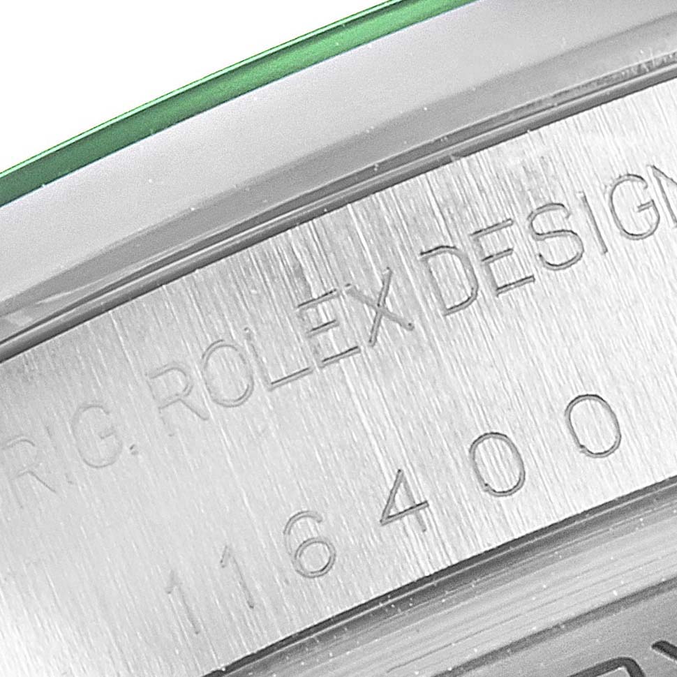 This image shows a close-up of the engraved case design and model number "116400" of the Rolex Milgauss 116400GV Men's Stainless Steel Blue Dial 116400GV Men's Stainless Steel Blue Dial watch.