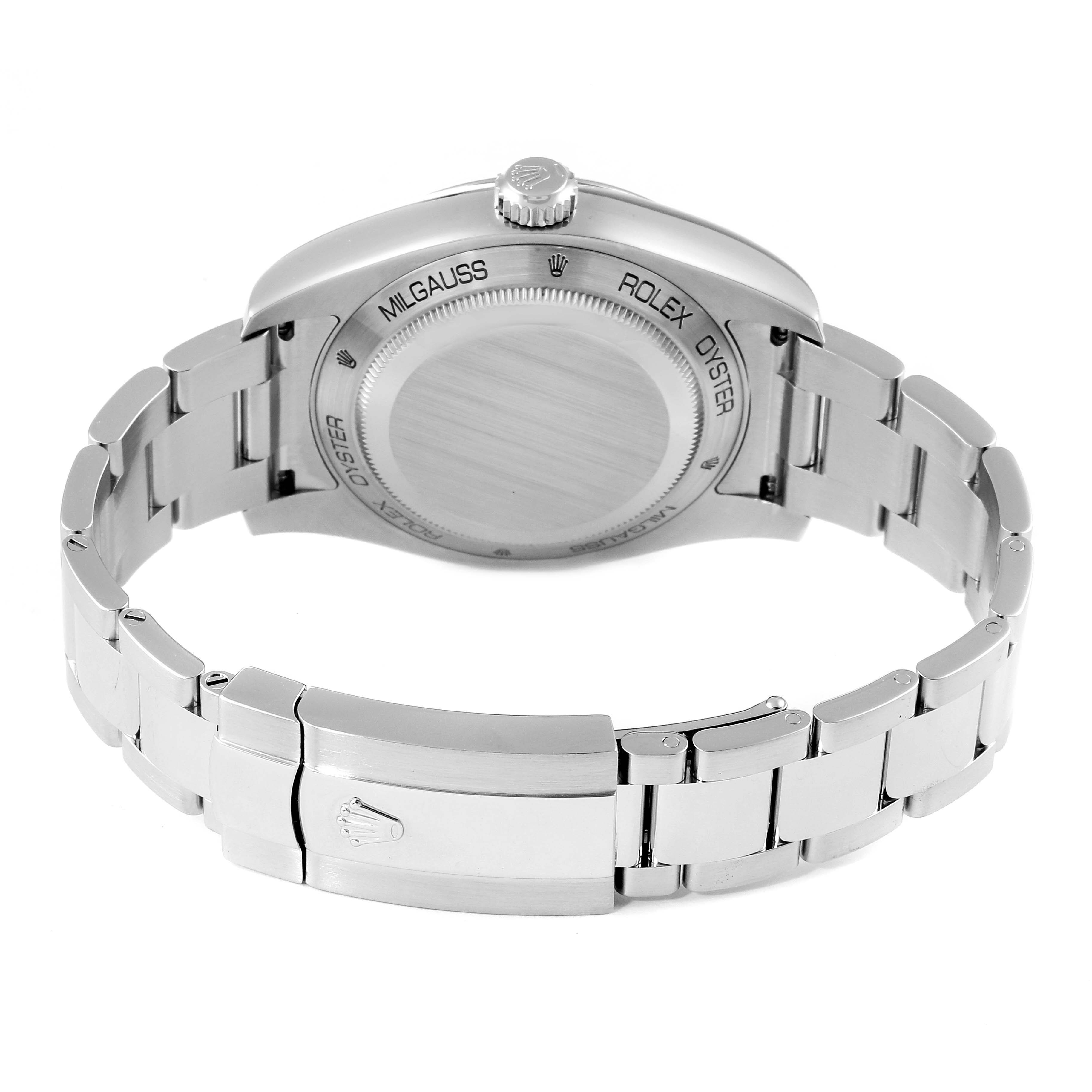 The image shows the back view of a Rolex Milgauss 116400GV Men's Stainless Steel Blue Dial 116400GV Men's Stainless Steel Blue Dial watch, highlighting its case back, crown, and metal bracelet.