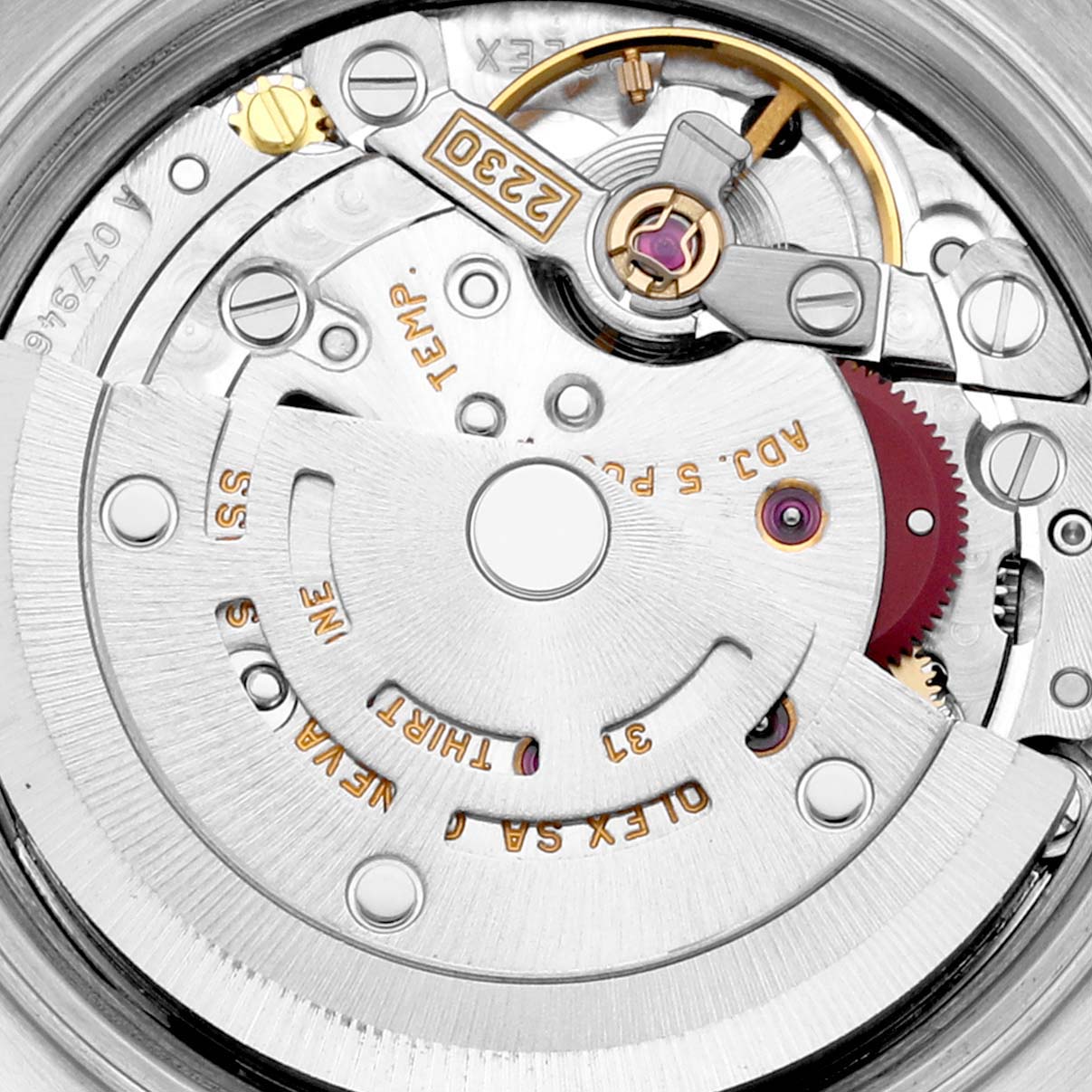 The image shows a close-up view of the movement mechanism inside a Rolex Oyster Perpetual 76193 Women's Steel and Gold (two tone) Black Dial 76193 Women's Steel and Gold (two tone) Black Dial watch.