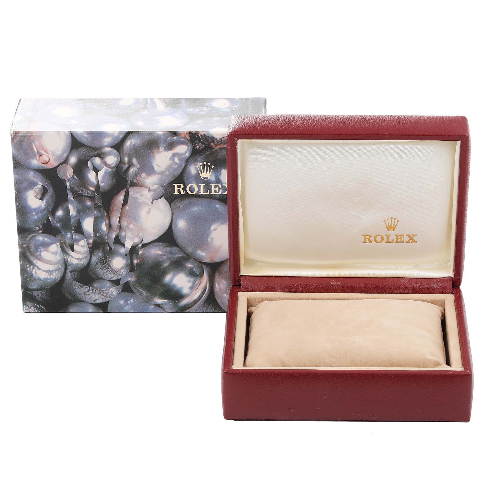 The image shows a Rolex Oyster Perpetual 67193 Women
s Steel and Gold (two tone) Champagne Dial 67193 Women
s Steel and Gold (two tone) Champagne Dial watch box and outer packaging, with the box open to reveal a padded area for the watch.