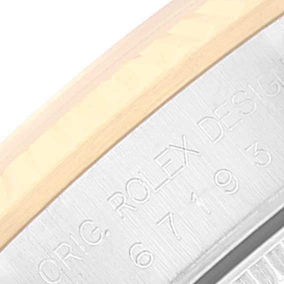 This close-up image shows the side engraving on an Oyster Perpetual model by Rolex, displaying the brand name and model number.