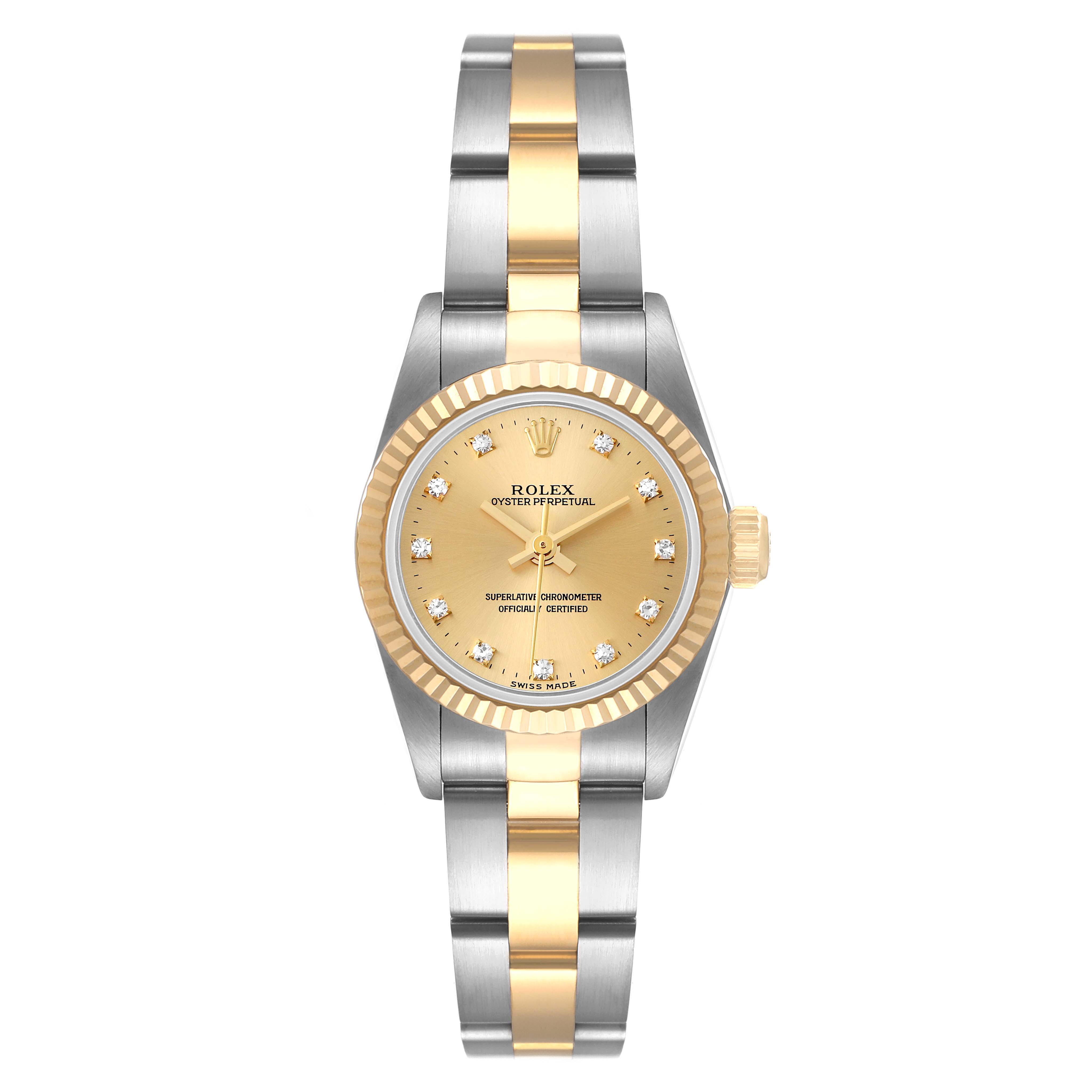 This Rolex Oyster Perpetual 67193 Women
s Steel and Gold (two tone) Champagne Dial 67193 Women
s Steel and Gold (two tone) Champagne Dial model is shown from a top-down angle, highlighting its gold and silver bracelet, fluted bezel, and dial.