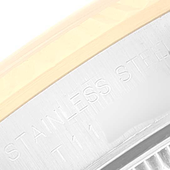This close-up image shows the side engraving on the stainless steel case of a Rolex Oyster Perpetual 67193 Women
s Steel and Gold (two tone) Champagne Dial 67193 Women
s Steel and Gold (two tone) Champagne Dial watch.