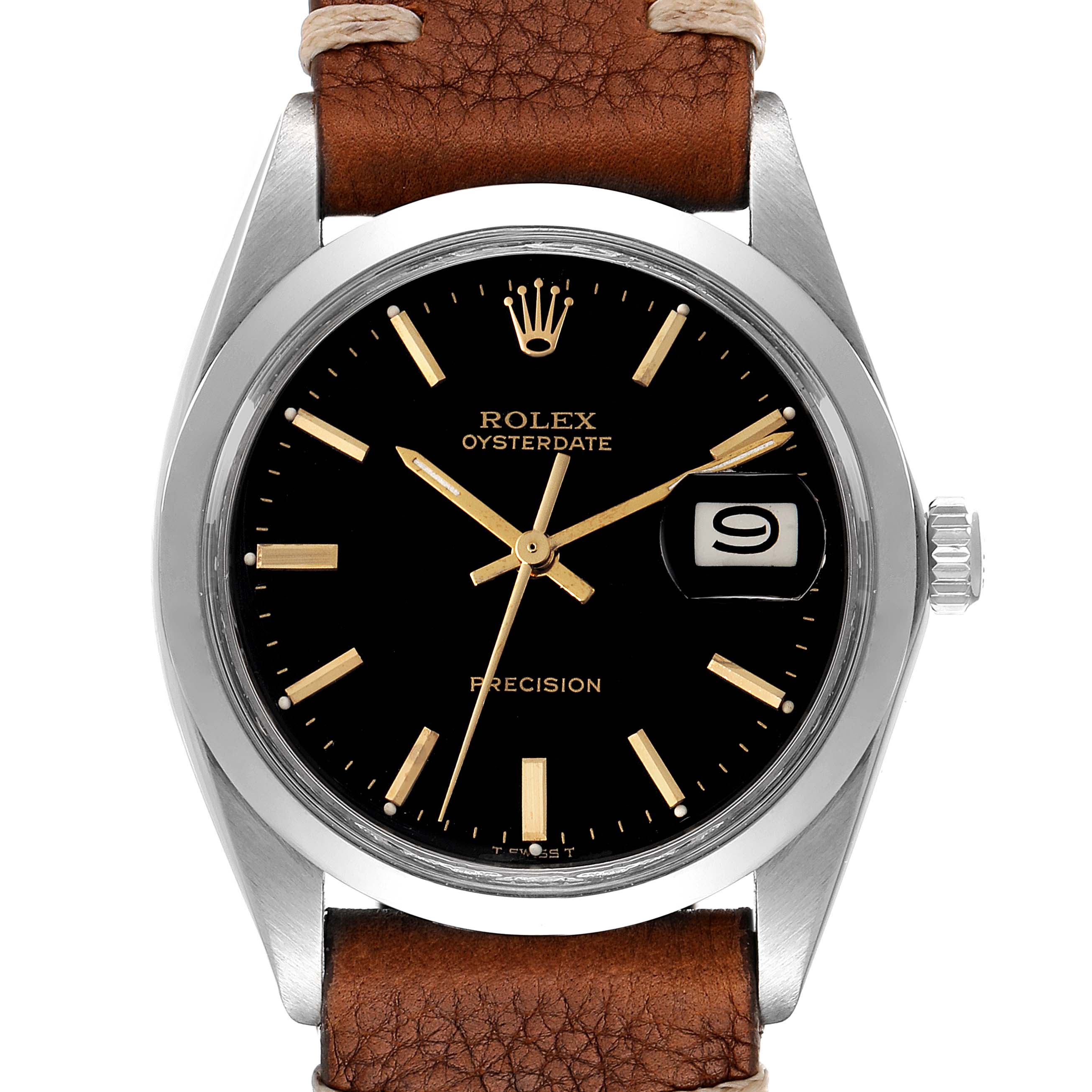 This image shows a close-up of a Rolex Oysterdate Precision watch face, including its black dial, date window, hands, and crown with a leather strap.