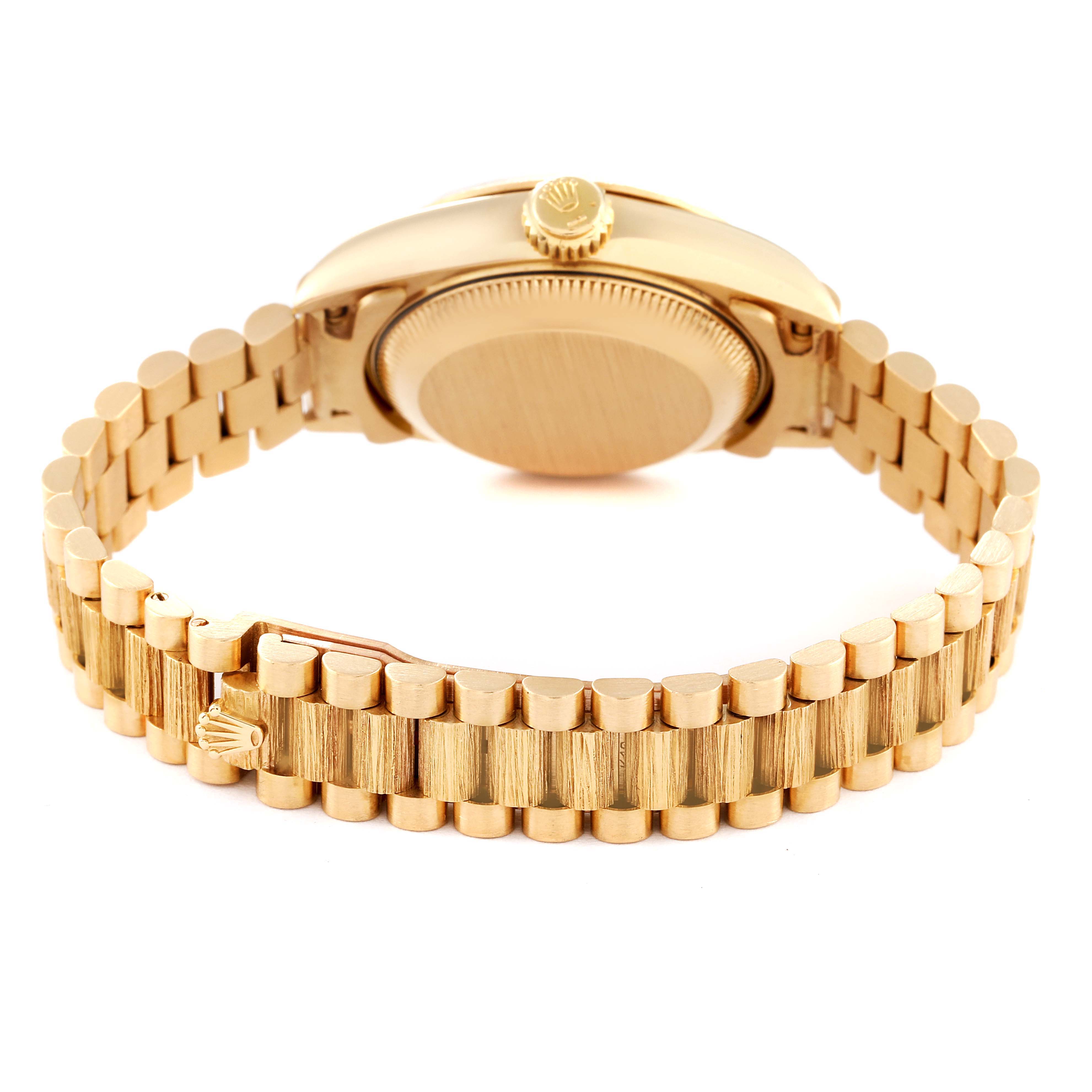 The Rolex President 69278 Women
s Yellow Gold Champagne Dial 69278 Women
s Yellow Gold Champagne Dial model watch is shown from the rear, displaying the bracelet, clasp, crown, and case back.