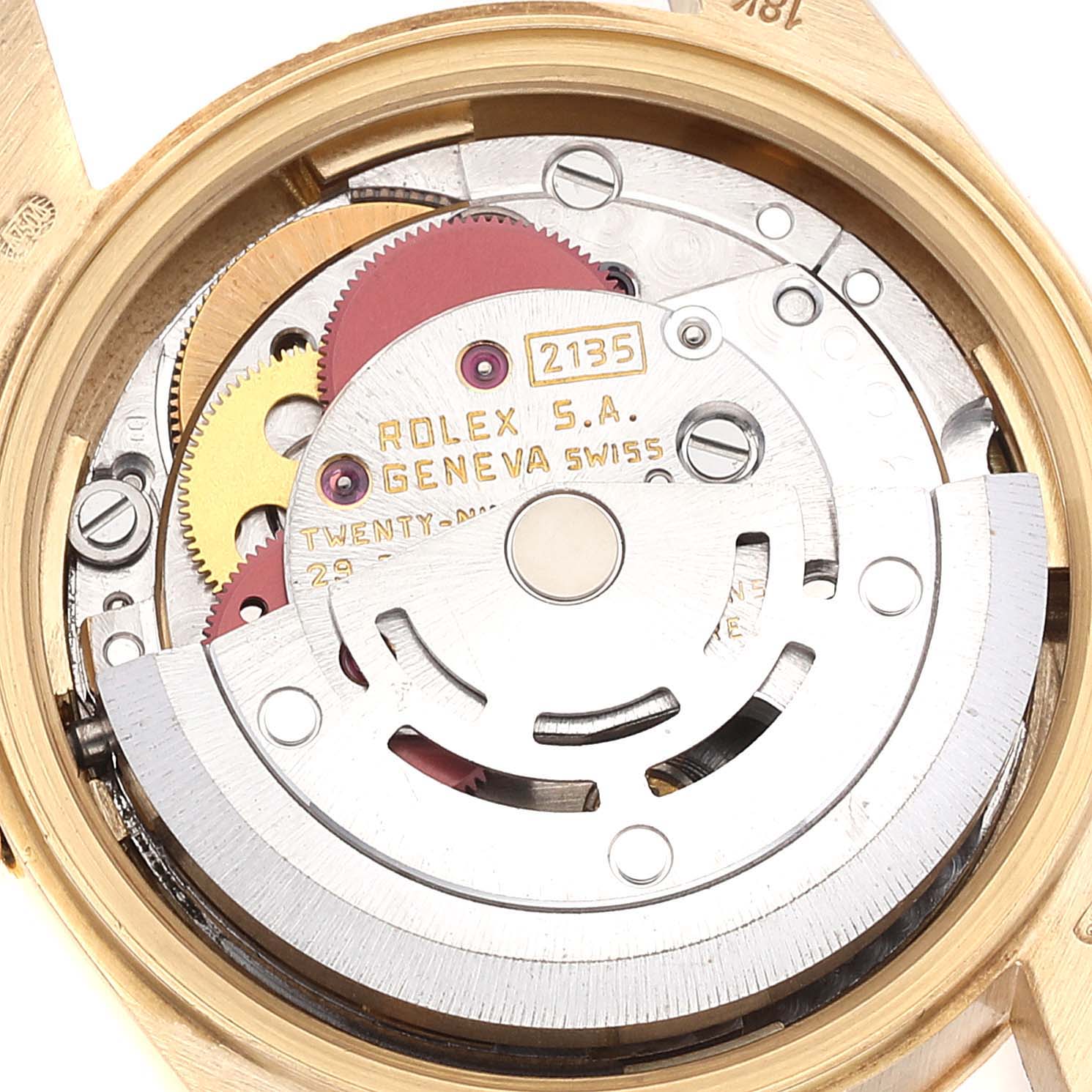 The image shows the intricate internal mechanism of a Rolex President 69278 Women
s Yellow Gold Champagne Dial 69278 Women
s Yellow Gold Champagne Dial Model, viewed from the case back.