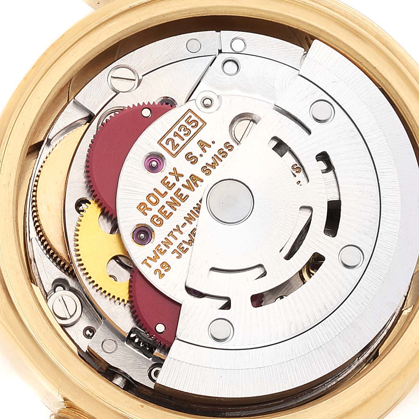 The image shows the inner mechanical movement of a Rolex President 69178 Women
s Yellow Gold Champagne Dial 69178 Women
s Yellow Gold Champagne Dial model watch at an angled close-up.