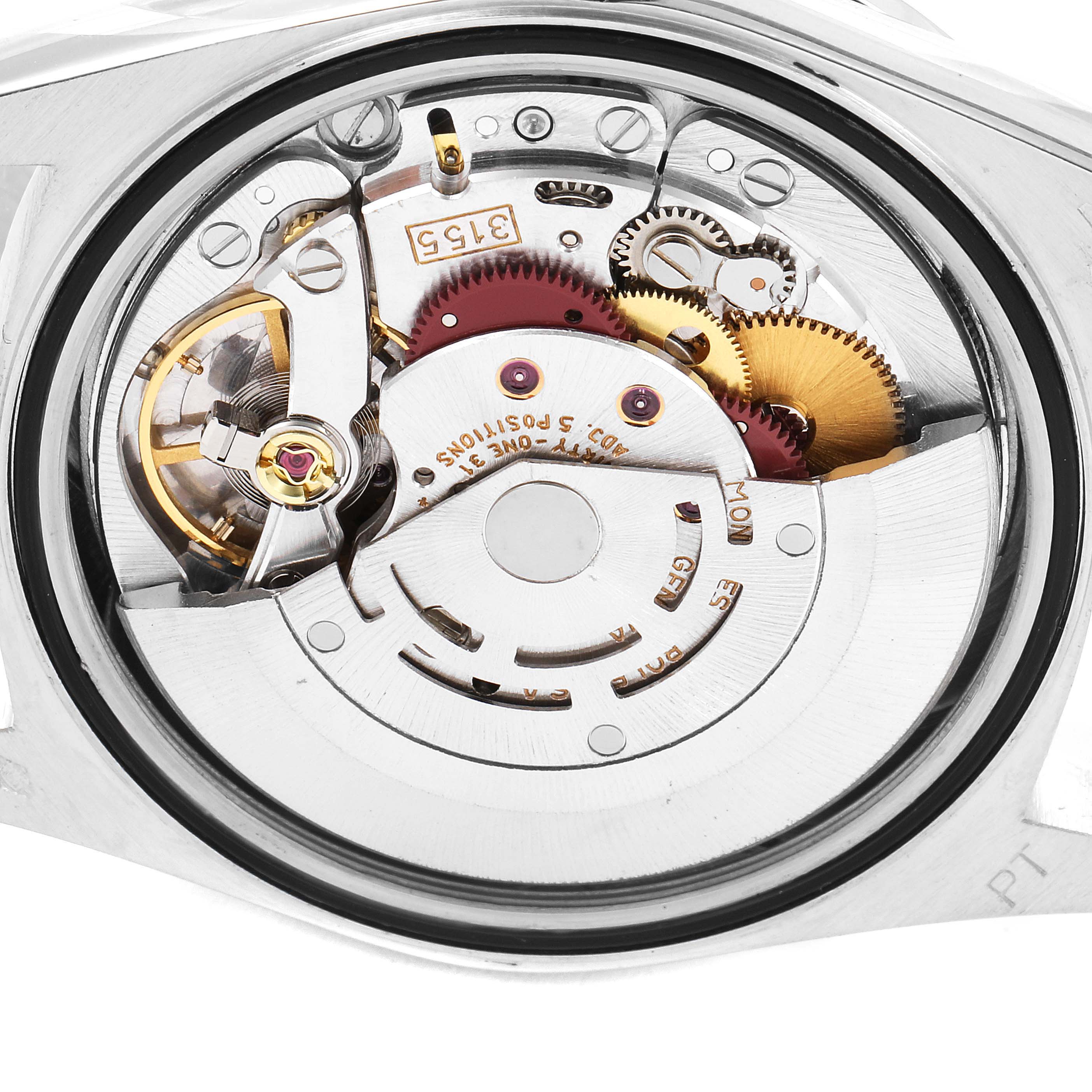 This image shows the intricate movement and internal components of a Rolex President 18346 Men's Platinum Silver Dial 18346 Men's Platinum Silver Dial model watch from a rear view angle.