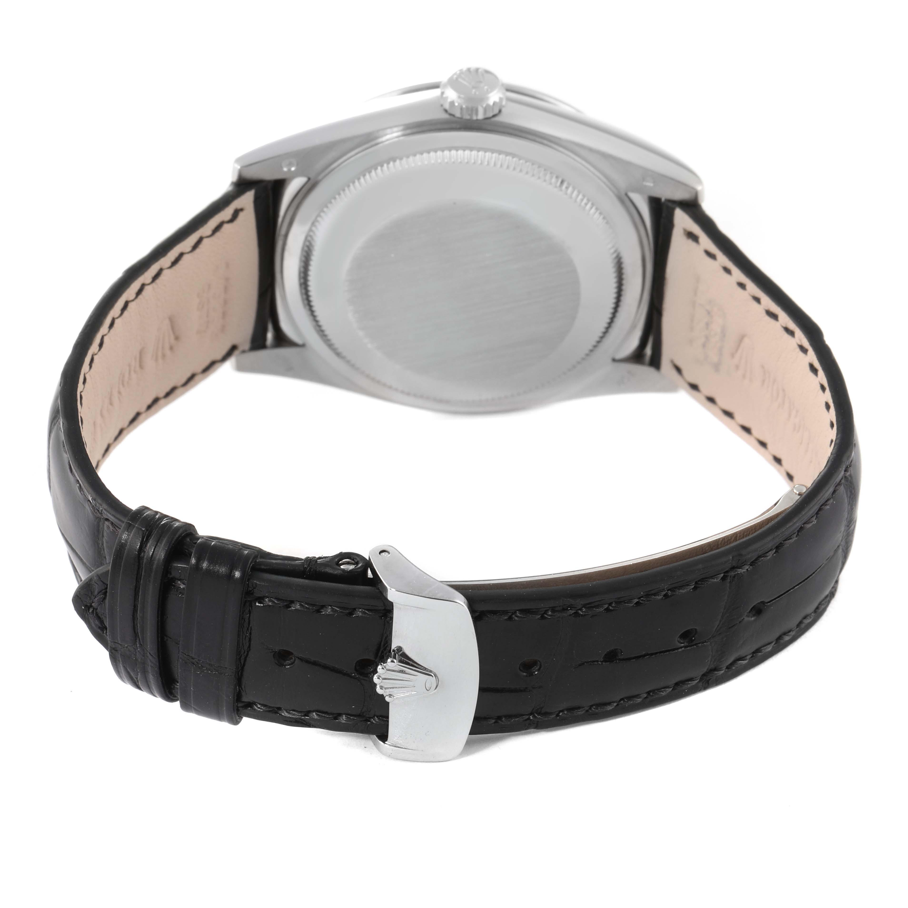 The image shows the back view of a Rolex President 118139 Men's Stainless Steel Blue Dial 118139 Men's Stainless Steel Blue Dial model watch, highlighting the case back and black leather strap with a clasp.