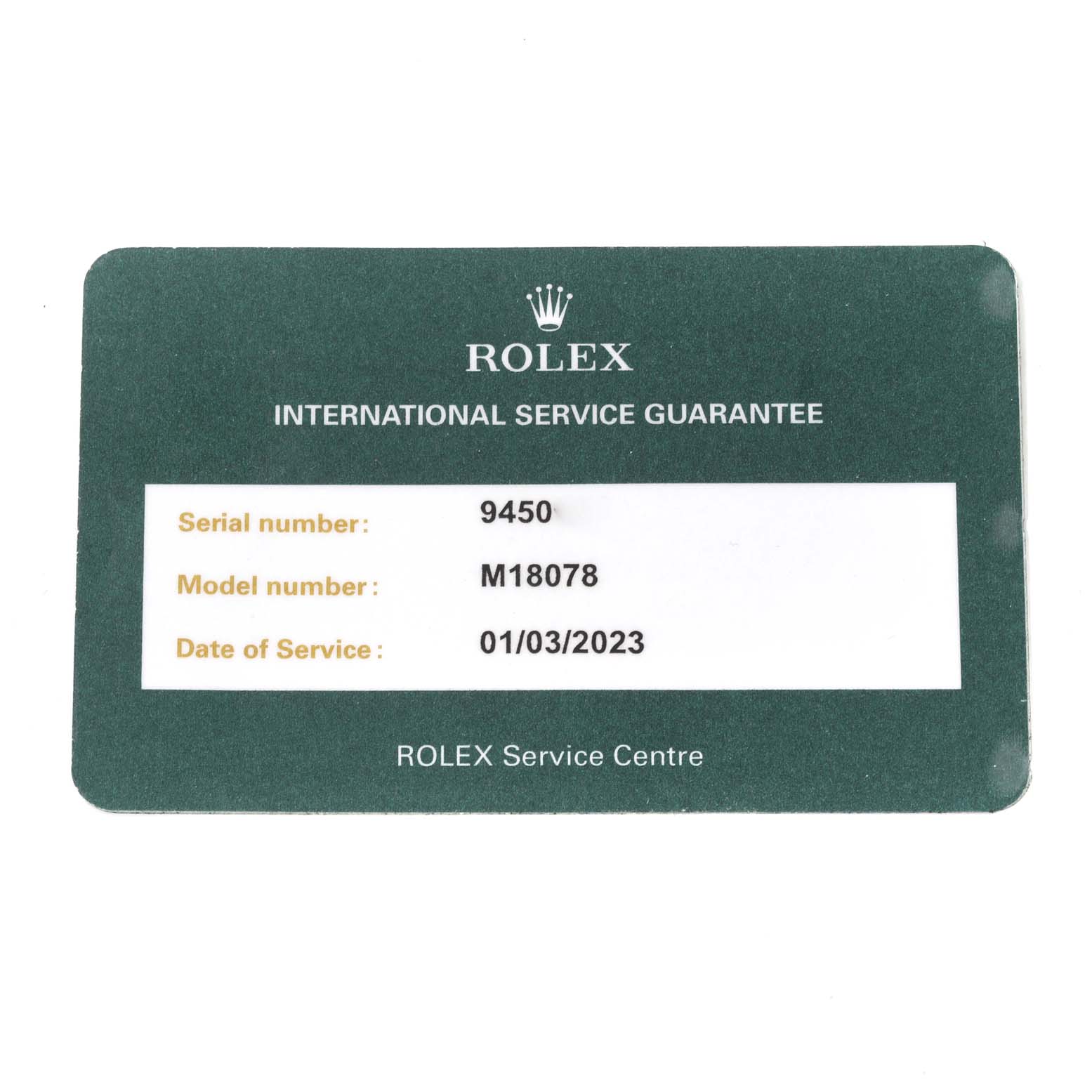 The image shows an International Service Guarantee card for a Rolex President 18078 Men
s Yellow Gold Black Dial 18078 Men
s Yellow Gold Black Dial model, M18078.