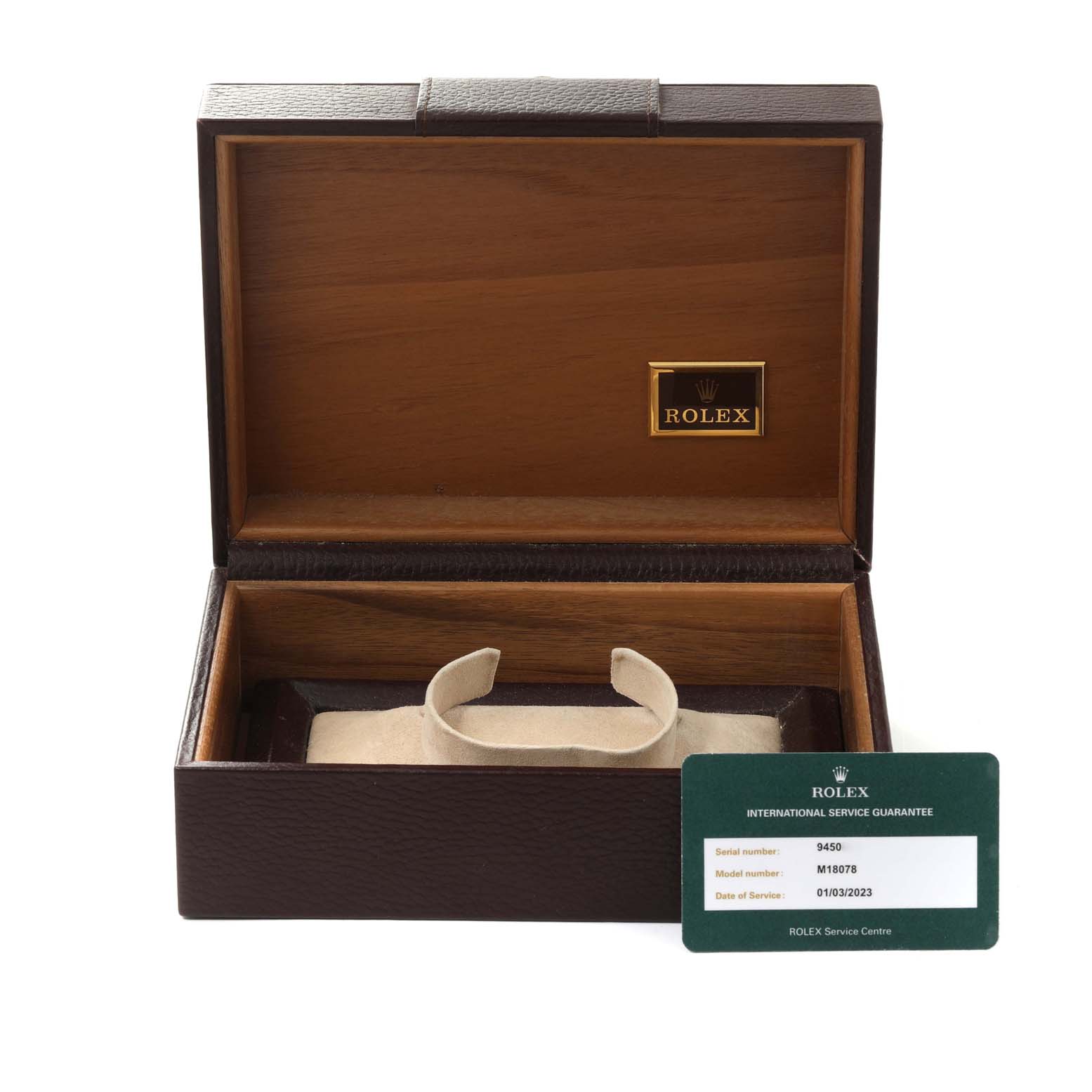 The image shows the open box and service guarantee card for a Rolex President 18078 Men
s Yellow Gold Black Dial 18078 Men
s Yellow Gold Black Dial model watch.