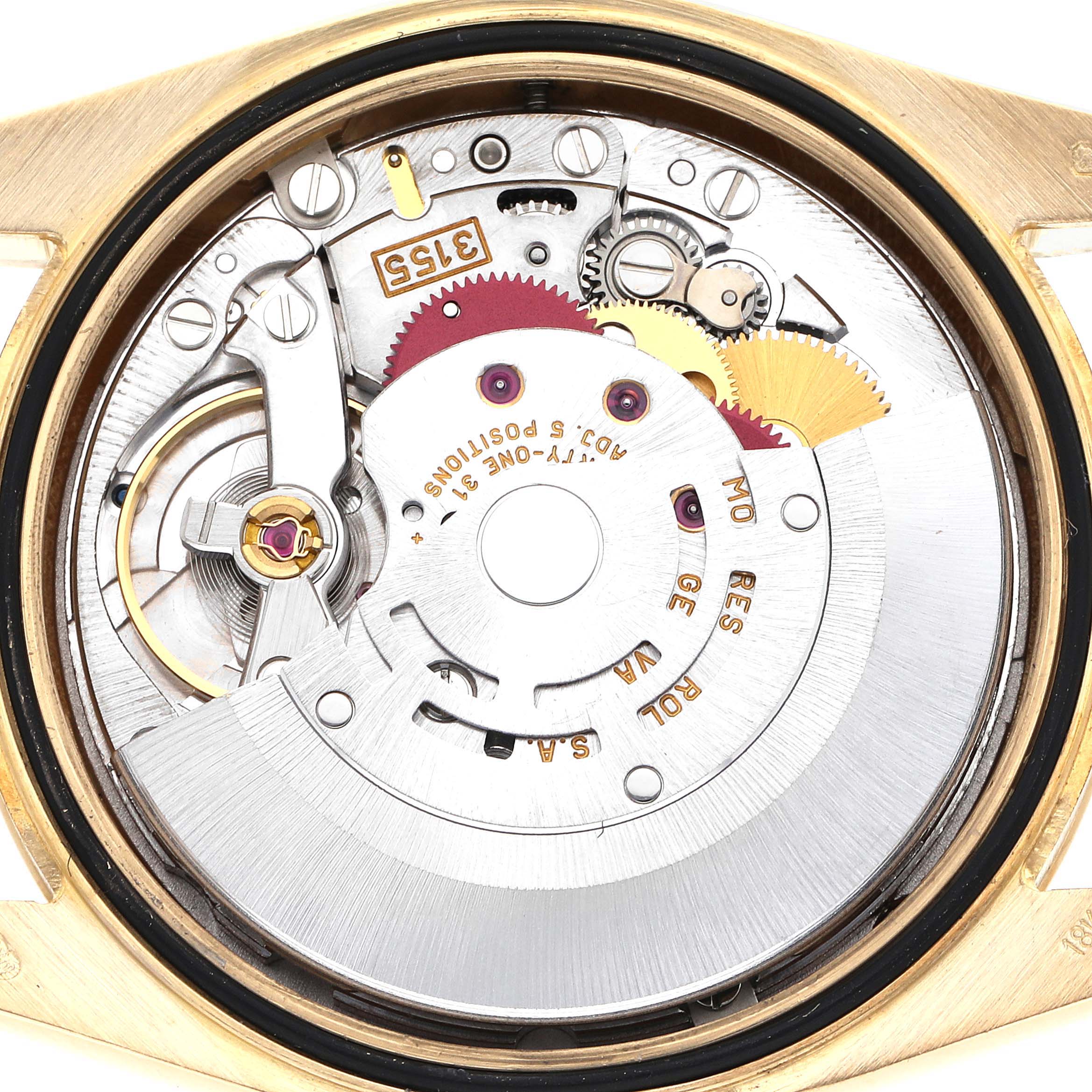 The image shows the movement of a Rolex President 118238 Men
s Yellow Gold Blue Dial 118238 Men
s Yellow Gold Blue Dial model, highlighting the intricate gears and rotor from the back angle.