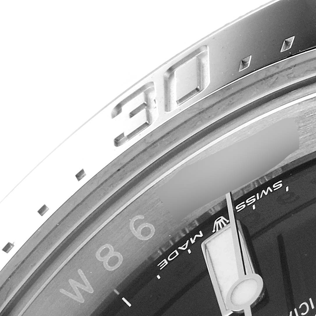 The image shows a close-up of the bezel and dial of a Rolex Sea-Dweller 126600 Men
s Stainless Steel Black Dial 126600 Men
s Stainless Steel Black Dial watch, focusing on the "30" marking and "Swiss Made" text.