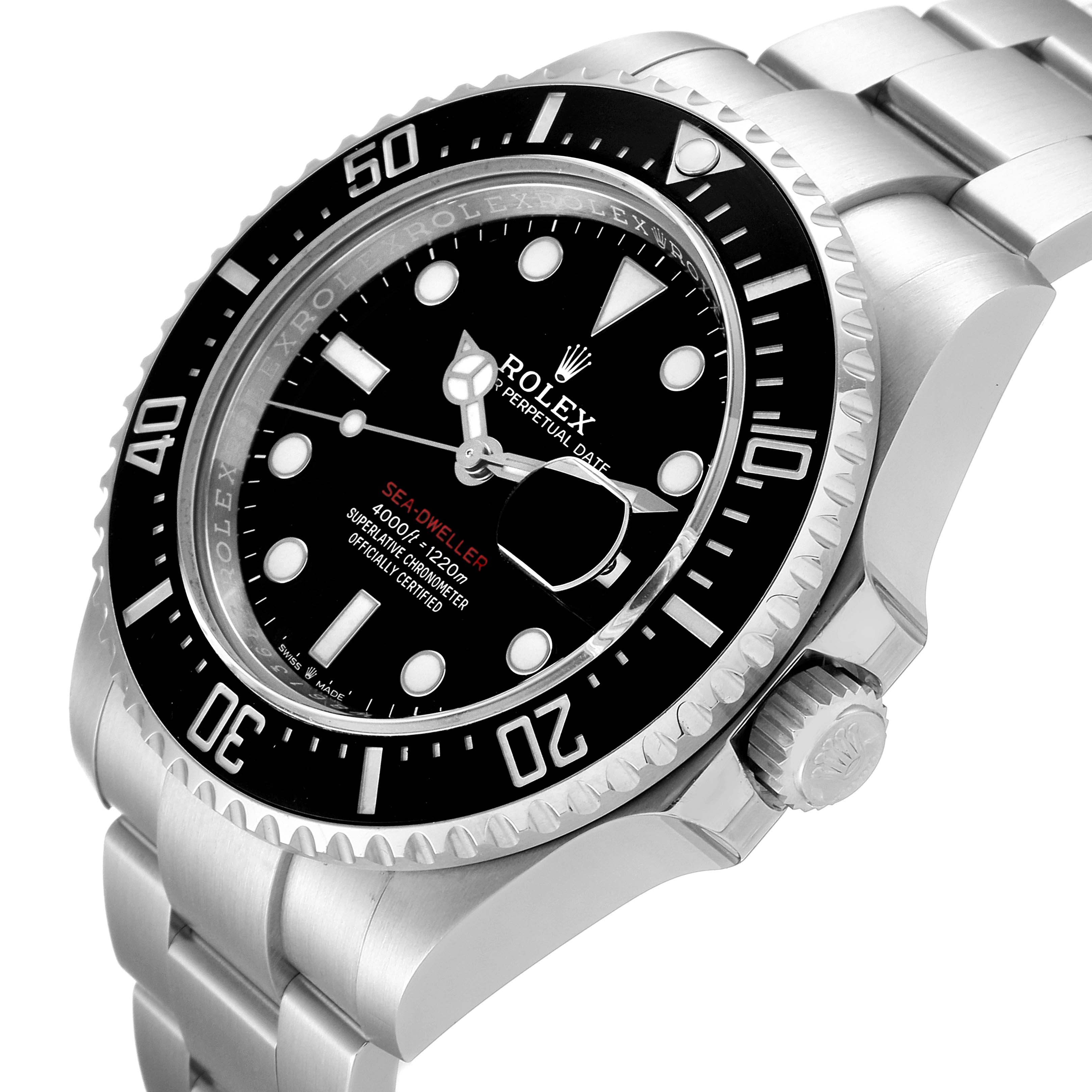 The image shows a Rolex Sea-Dweller 126600 Men
s Stainless Steel Black Dial 126600 Men
s Stainless Steel Black Dial watch from an angled side view, highlighting the bezel, dial, and part of the bracelet.