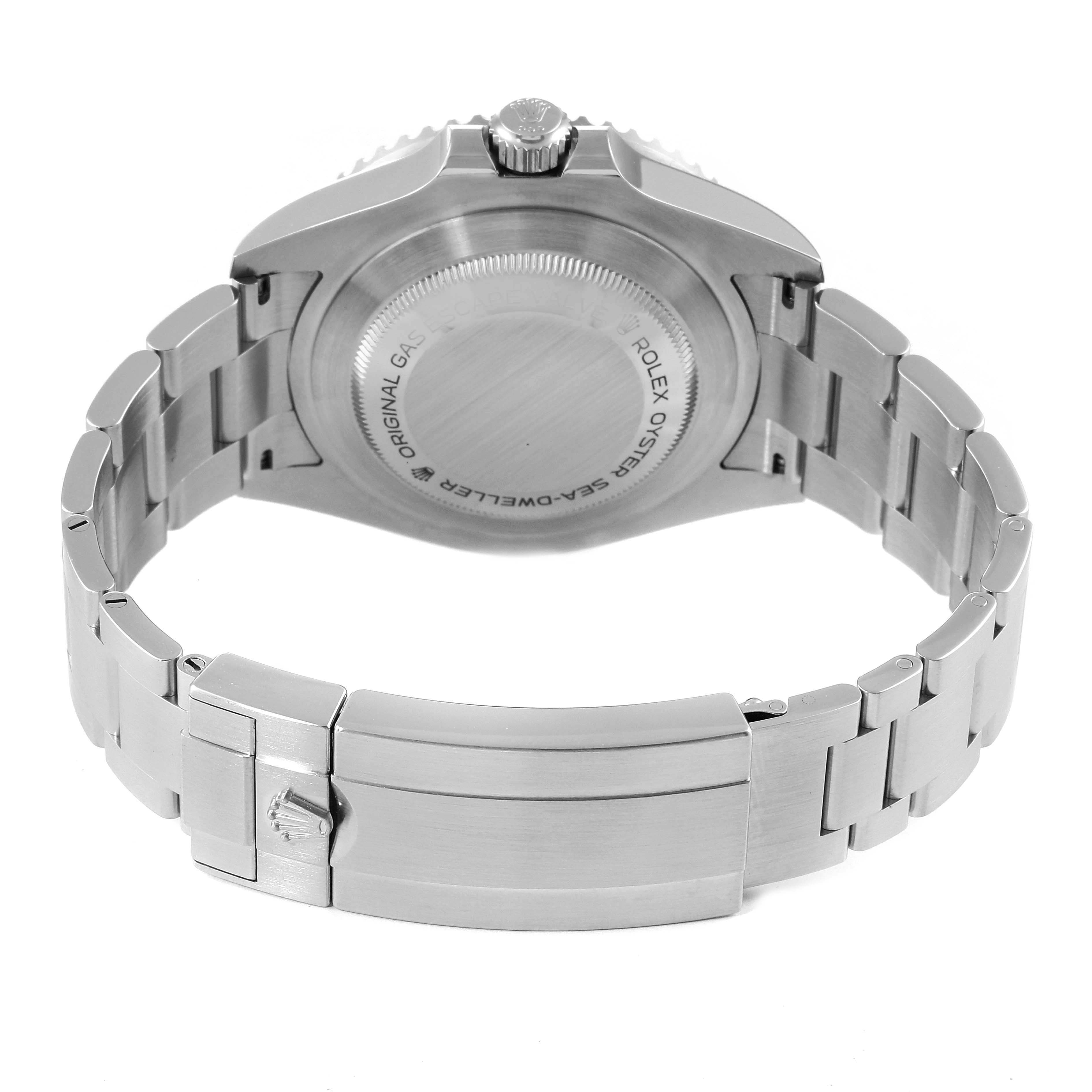 This image shows the back view of a Rolex Sea-Dweller 126600 Men
s Stainless Steel Black Dial 126600 Men
s Stainless Steel Black Dial watch, focusing on the case back, crown, and bracelet clasp.