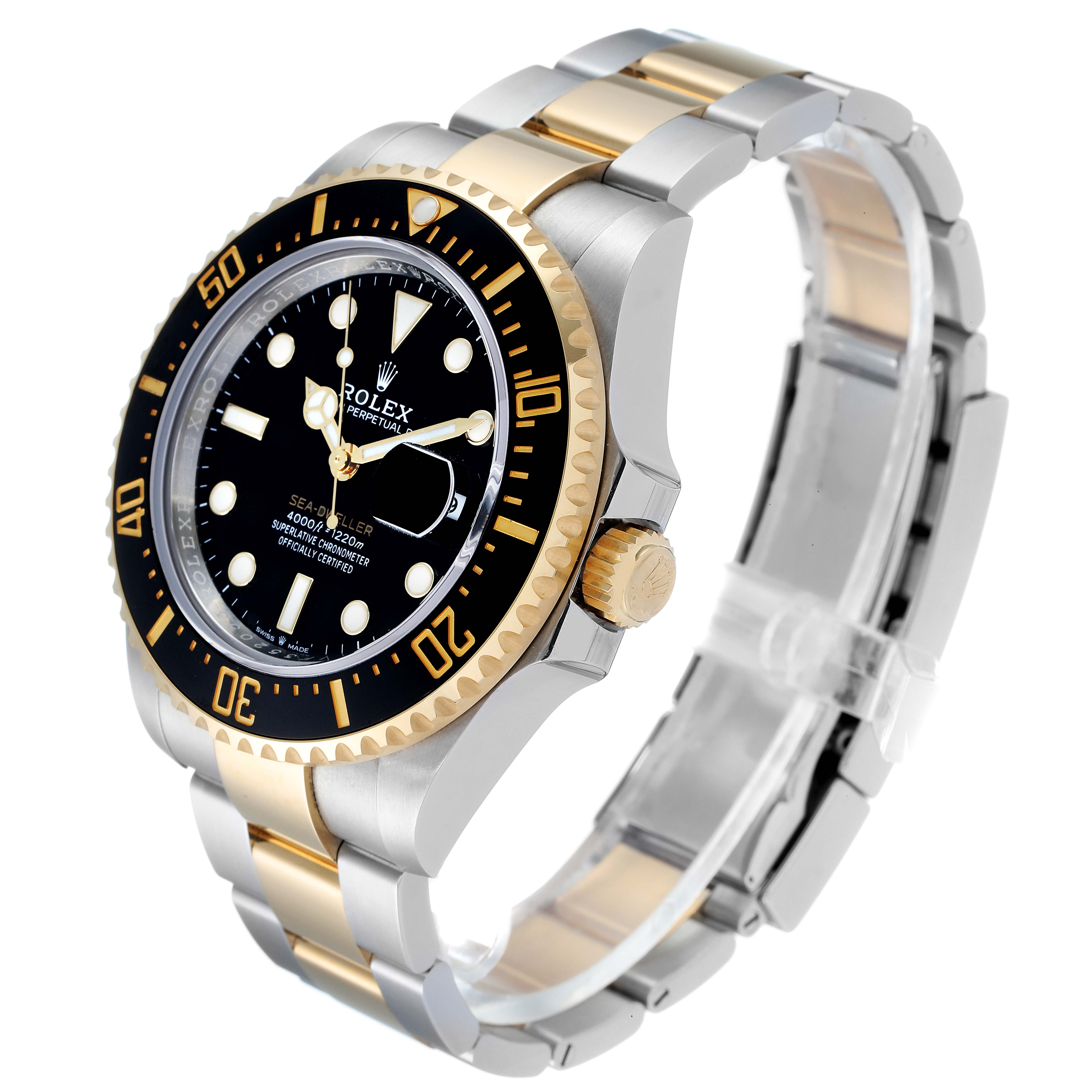 The Rolex Sea-Dweller 126603 Men
s Steel and Gold (two tone) Black Dial 126603 Men
s Steel and Gold (two tone) Black Dial watch is shown at an angled view, highlighting its black dial, gold bezel, and two-tone bracelet.