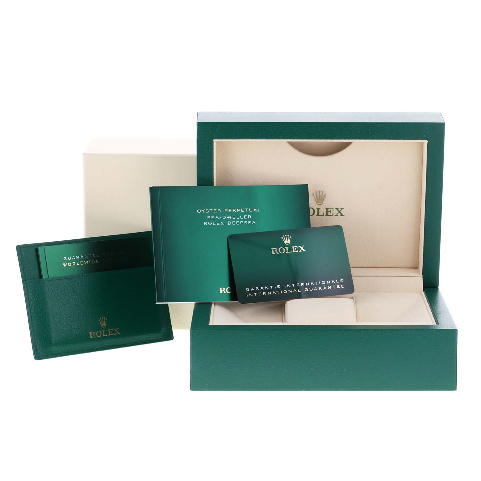 This image shows the packaging and accessories for the Rolex Sea-Dweller 126603 Men
s Steel and Gold (two tone) Black Dial 126603 Men
s Steel and Gold (two tone) Black Dial, including the box, warranty card, and manuals.