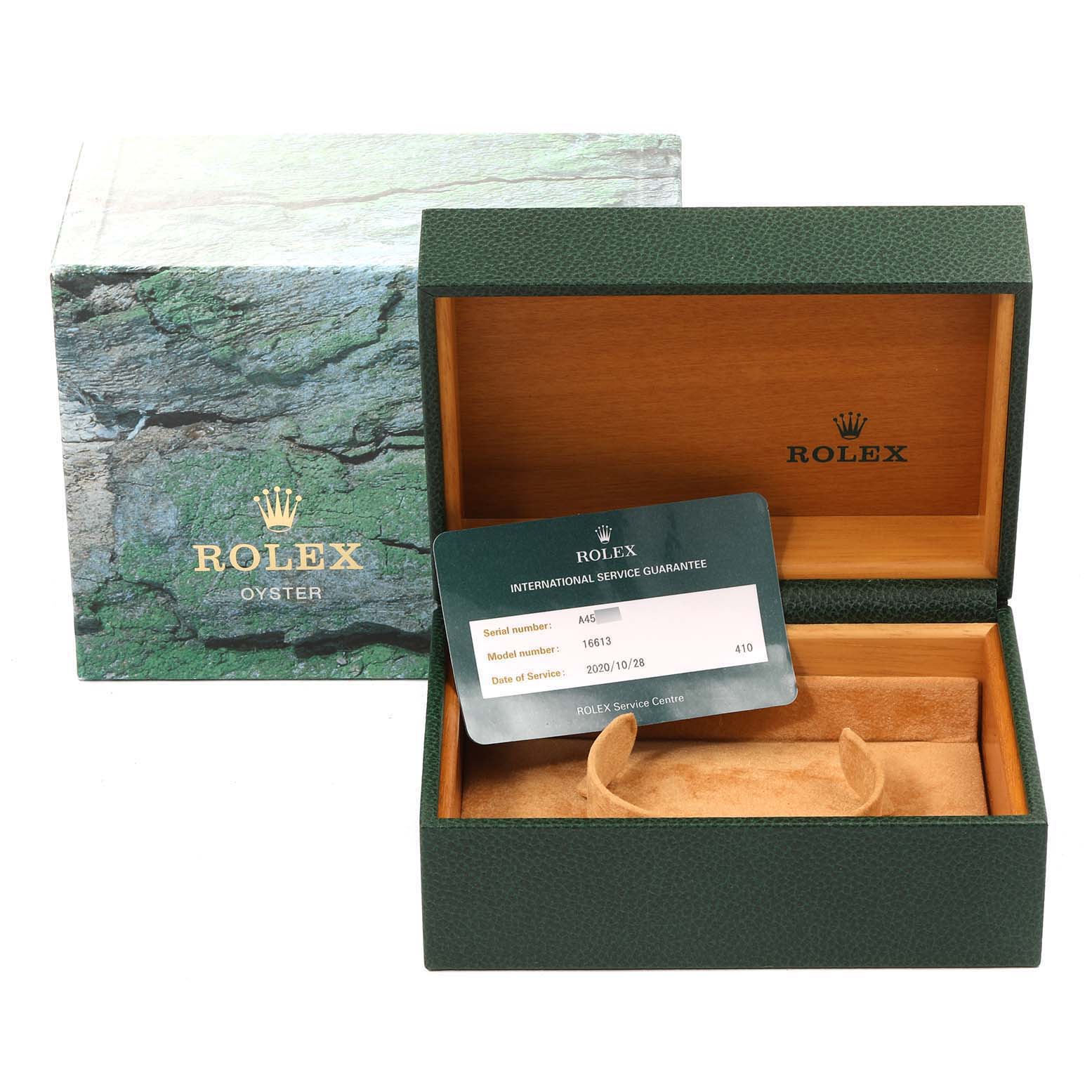 The image shows an open Rolex Submariner 16613 Men's Steel and Gold (two tone) Black Dial 16613 Men's Steel and Gold (two tone) Black Dial model watch box, the outer box, and an international service guarantee card.