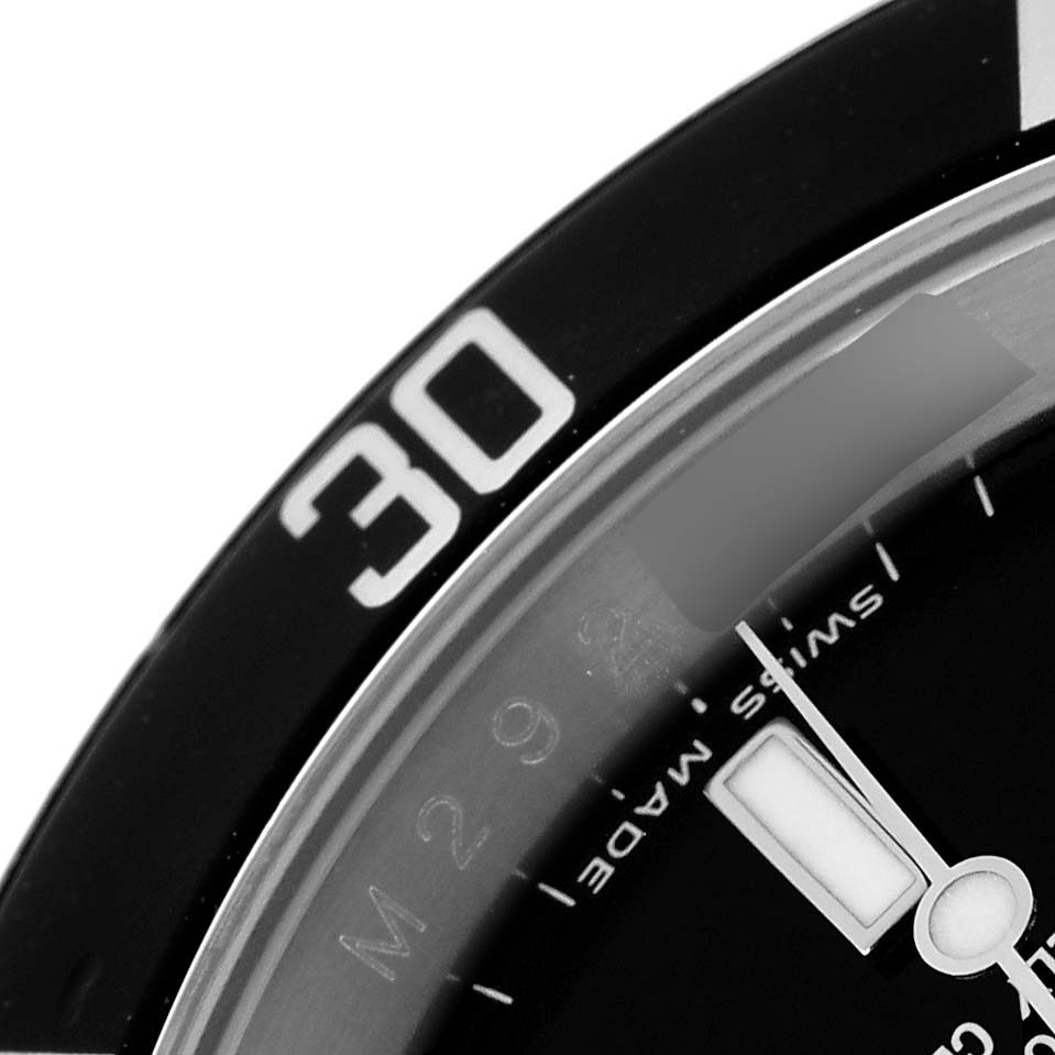 The image shows a close-up of the Rolex Submariner 16610 Men
s Stainless Steel Black Dial 16610 Men
s Stainless Steel Black Dial
s bezel and part of the dial, highlighting the "30" marker and minute hand.