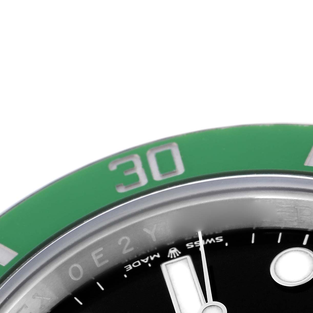 The image shows a close-up of the Rolex Submariner 126610LV Men
s Stainless Steel Black Dial 126610LV Men
s Stainless Steel Black Dial
s green bezel and part of the dial, focusing on the 30-minute marker.