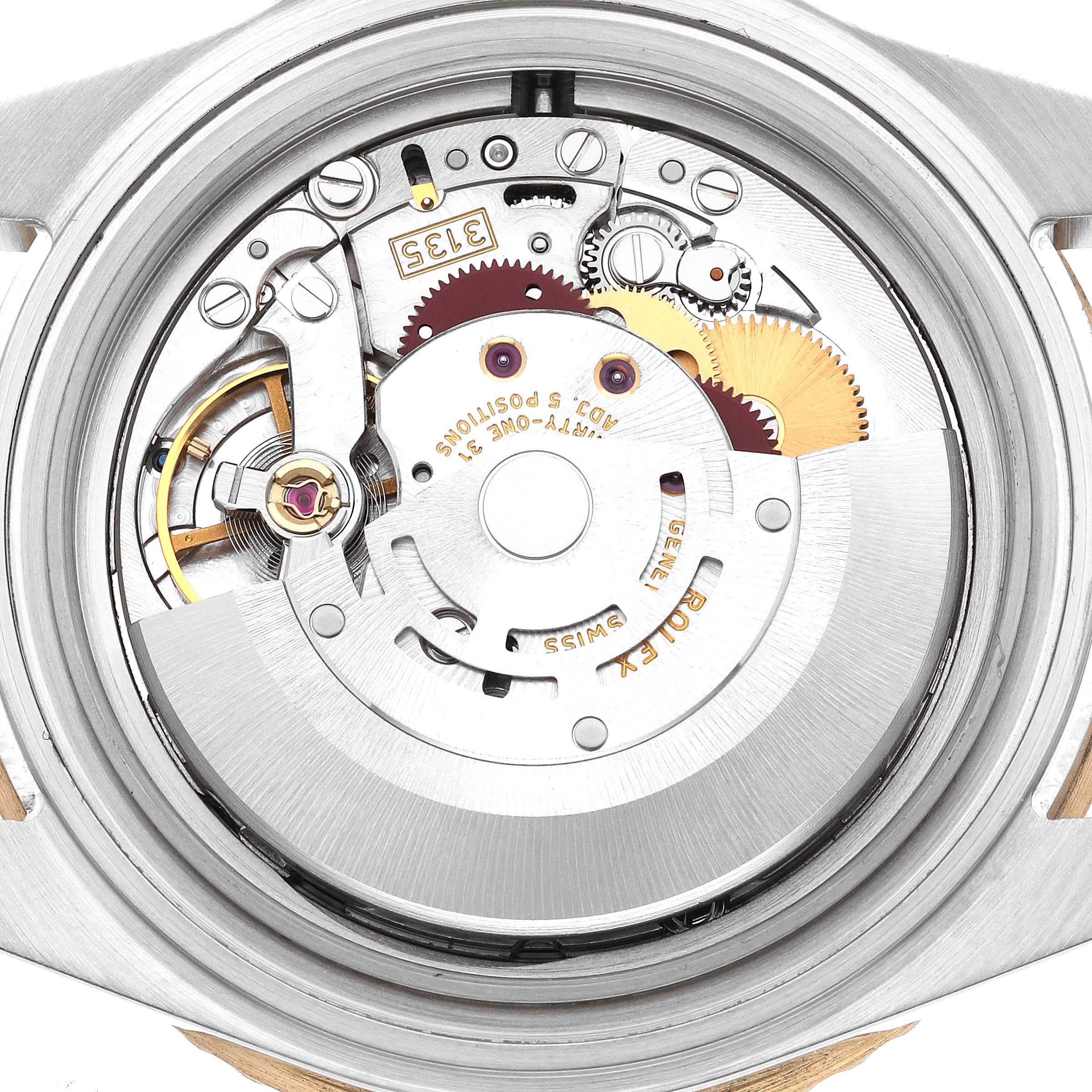 The image shows the internal mechanical movement of a Rolex Submariner 16613 Men's Steel and Gold (two tone) Black Dial 16613 Men's Steel and Gold (two tone) Black Dial watch from a top-down angle.