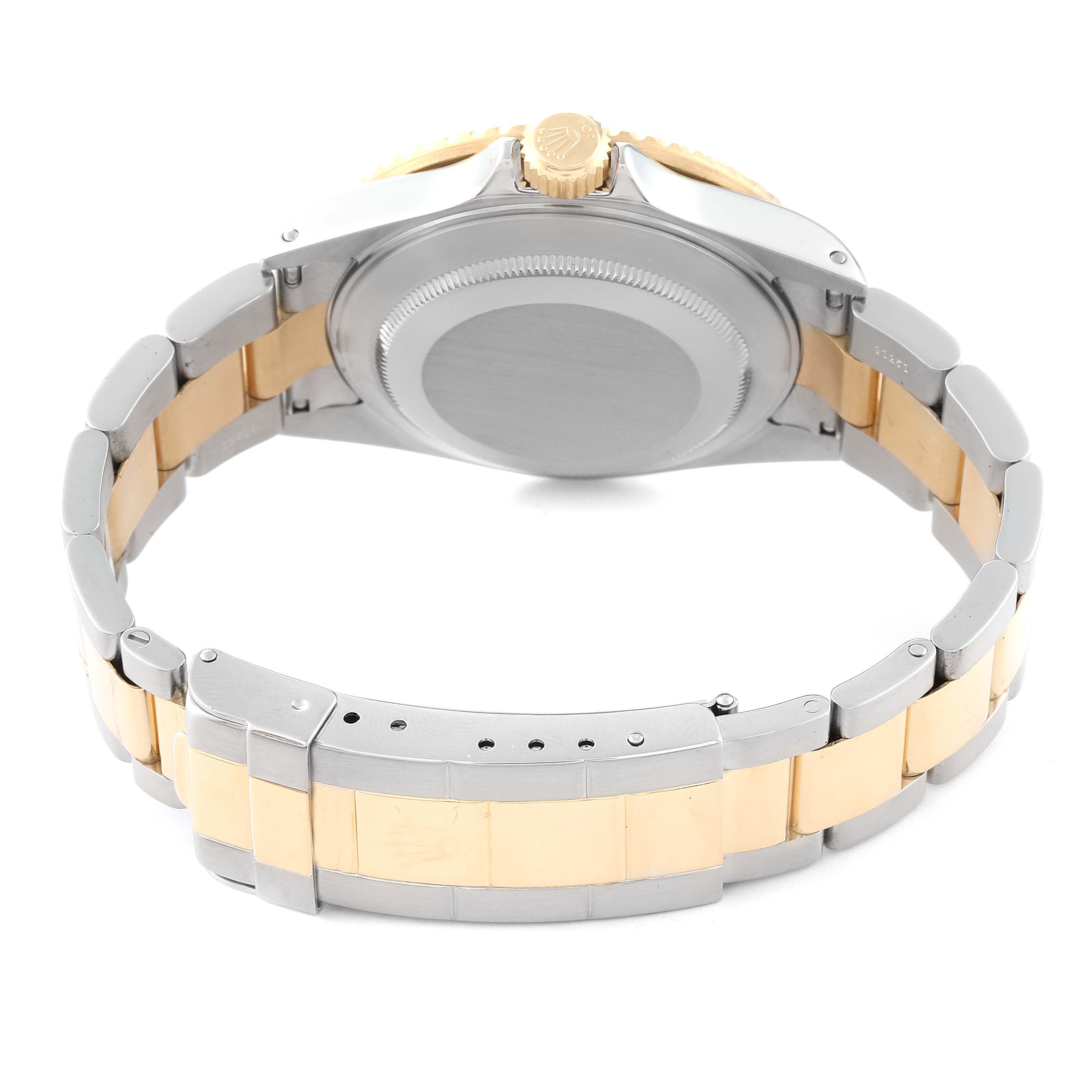 This image shows the back view of a Rolex Submariner 16613 Men's Steel and Gold (two tone) Black Dial 16613 Men's Steel and Gold (two tone) Black Dial watch, highlighting the case back and the two-toned bracelet.