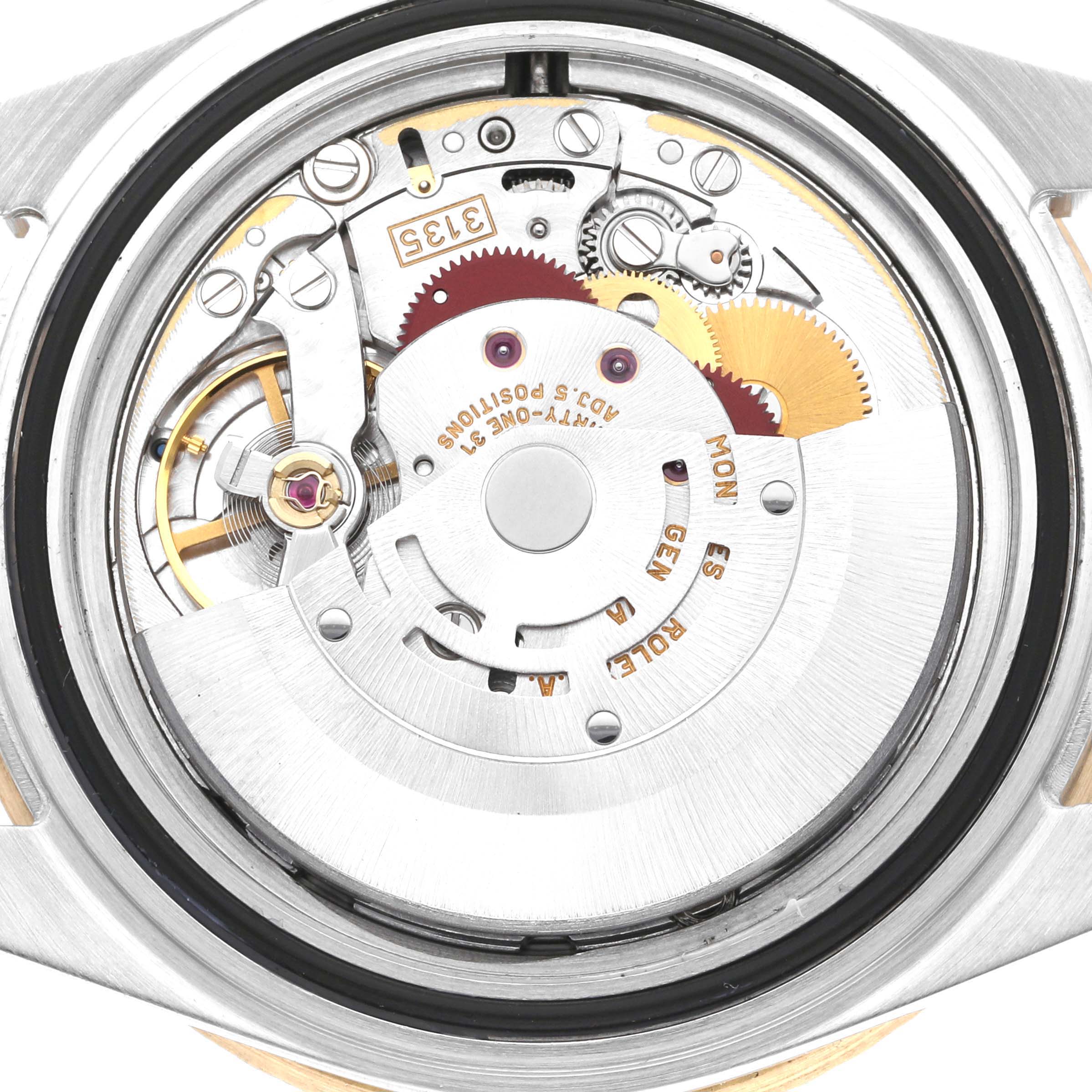 This image shows the back view of the Rolex Submariner 16613 Men's Steel and Gold (two tone) Black Dial 16613 Men's Steel and Gold (two tone) Black Dial watch, highlighting its intricate movement and internal mechanics.